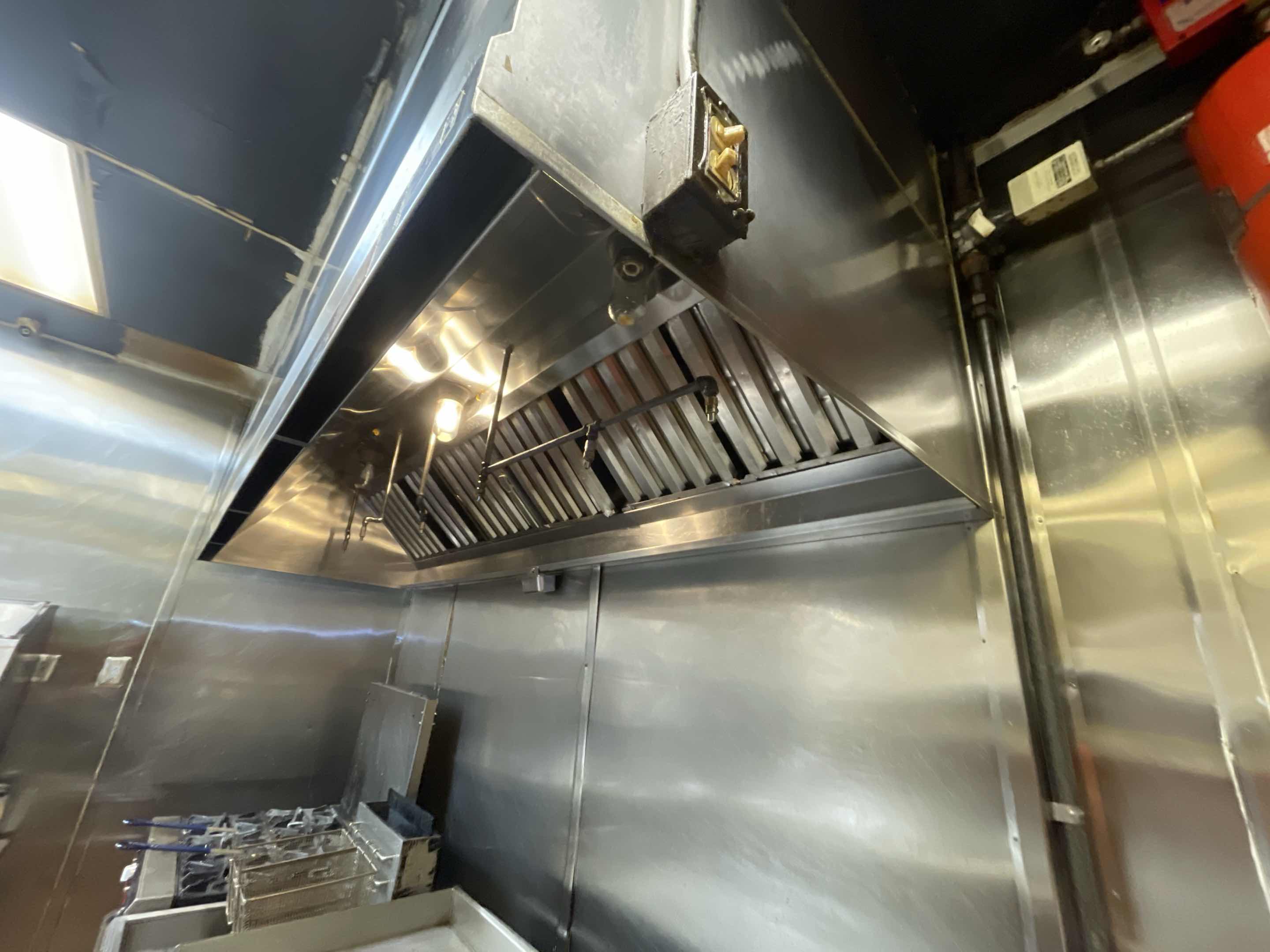Our team conducted a thorough hood cleaning service for a commercial kitchen. We began by inspecting the kitchen's ventilation system to identify areas with heavy grease buildup. Using specialized equipment, we safely removed accumulated grease from the ductwork, filters, and other components. This process involved disassembling parts of the ventilation system to ensure 