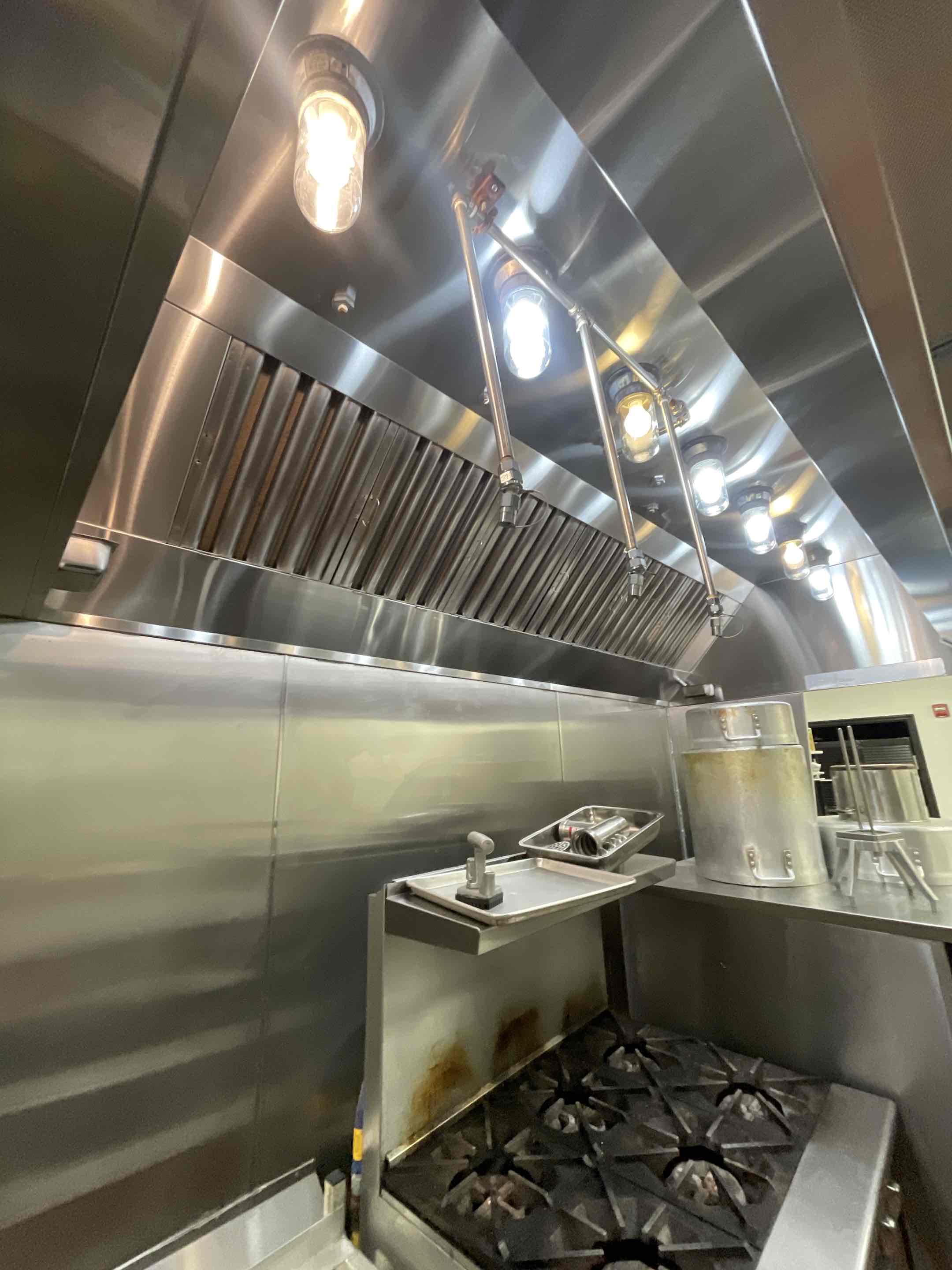I meticulously cleaned the kitchen hood system, ensuring all grease and grime were removed. This included disassembling and reassembling the hood components, cleaning the filters, and inspecting the ductwork for any blockages. I also polished the exterior and interior surfaces to restore their shine. The hood was tested for proper operation and airflow. This thorough cleaning not only improved the kitchen's hygiene but also enhanced its overall efficiency and appearance.