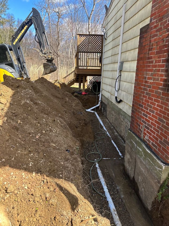 Footing drain installation on this home to help with water coming in through the foundation  Footing drain installation on this home to help with water coming in through the foundation