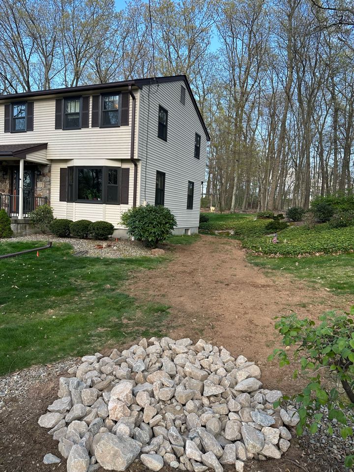 Installed  some gutter downspouts underground to discharge into rip rap  