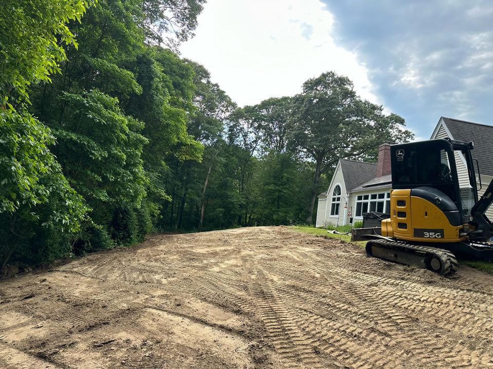 Changing grade so this backyard is mowable  now! Ready to get some topsoil !