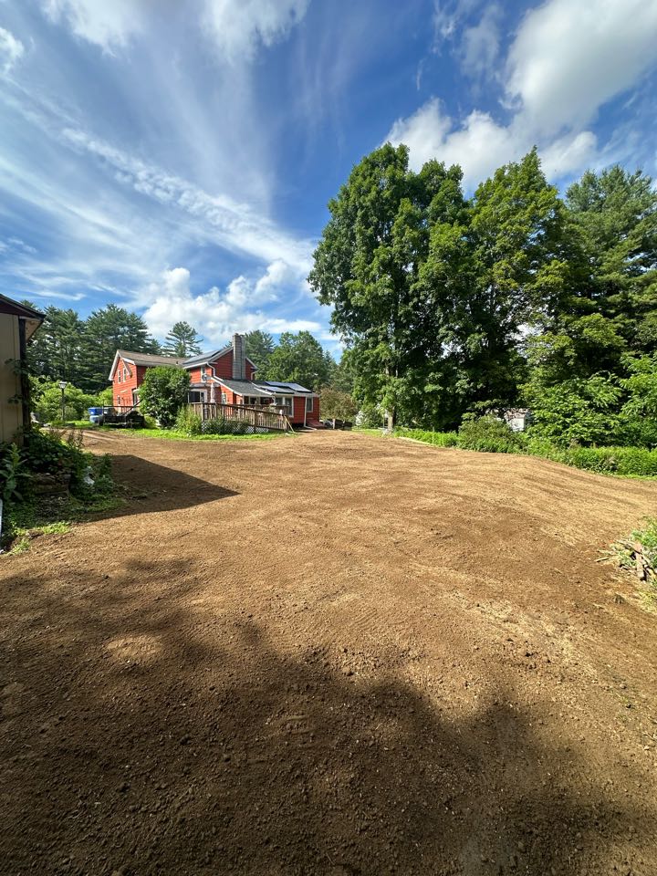 Topsoil and seed spread over the new system !