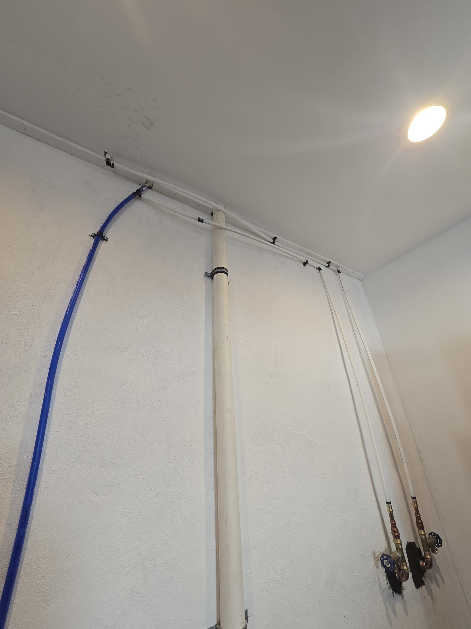 We arrived back to the home to install the customer supplied rinse station, due to time restrictions, the client has requested that we return first thing in the morning, next Tuesday.

Arrived back to the home.
Installed customer supplied outdoor rinse station.
Drilled holes through the concrete block and existing enclosure.
Mounted rinse station.
Ran copper piping through the block and sleeved it from the concrete.
Supplied and installed winterization station behind rinse station with boiler drain valves.
Supplied and install only one ball valve under the kitchen sink for the hot side of the rinse station.
Ran white pex piping from up top to the winterization station below.
Secured all my connections and turned the home back on and checked for leaks.
There are no leaks at this time.

*No warranty offered for any customer supplied products.
*Full warranty provided on parts and pipe installed by MyGuy Plumbing.
*All warranty is voided if customer does not winterize the system prior to t