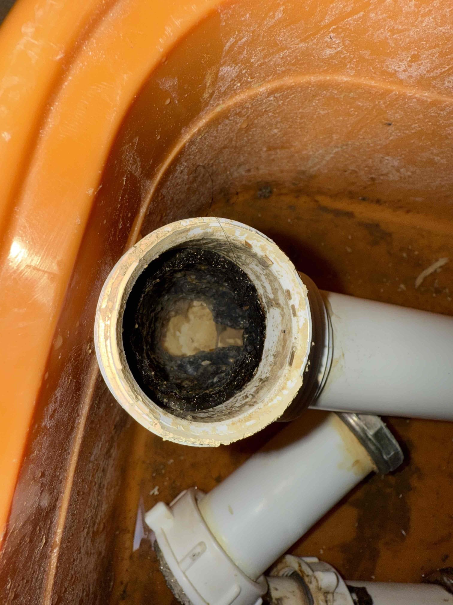 Upon arrival customer explained that there is a leak under the kitchen sink sound coming from a toilet and a sound coming from washing machine random upon further inspection we discovered that there is just water dripping from hose connected to relief valve in the toilet tank causing the sound of the toilet could not re-create sound with washing machine so unable to diagnose issue at this time customer will call back if sound persist in to address leak under kitchen sink we replace trap assembly. All work was tested for leaks and proper function. All work functions properly in their load. No leaks found at this time.