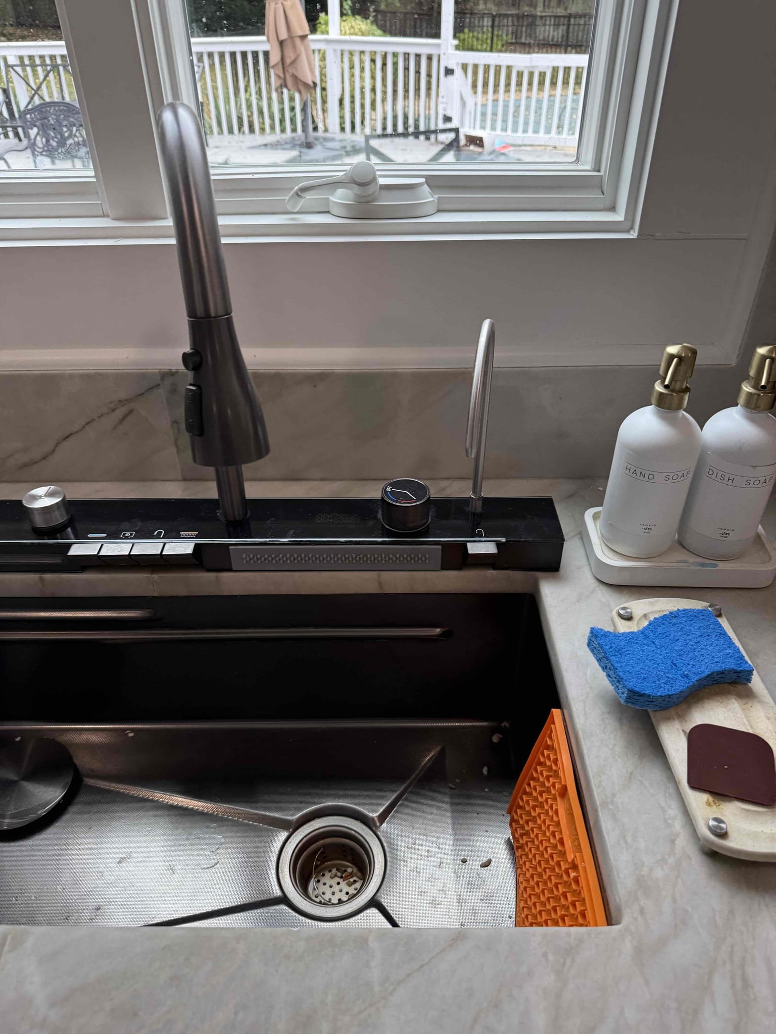    


Arrived to the home, customer had recently had a kitchen sink installed that they had purchased through wayfair, ever since the install, the kitchen sink struggles to drain properly. Kitchen sink set up is not up to code for many reasons, main reason is the bottle trap located under the strainer. There are many functions of this sink set up, coms with built in electronics, bottle rinsed, temp dial and many more. Client had purchased a disposal thinking that the force work help the sink drain. Upon playing with the functions on top, there is a function that plugs the sink. I turned the dial, and the sink drained properly. The plug was left half open from the initial install which is why it struggled to drain. I advised to the client that ultimately replacement of the sink with something more practical is highly recommended. The existing demensions of the sink are rare with it being a 33 x 18in, also there are 5 hold drilled in the granite for the multiple functions as well as a ho