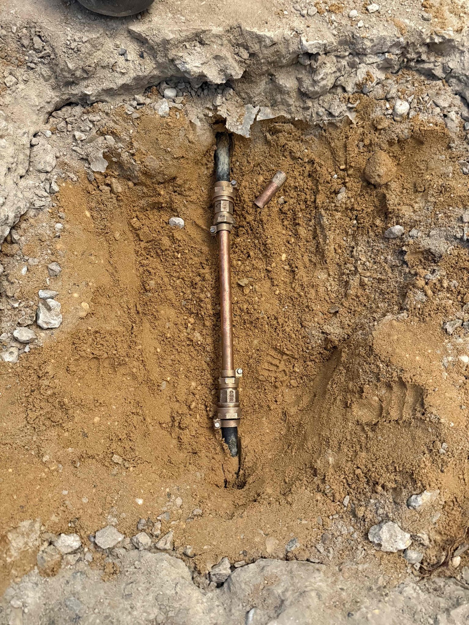 Remove concrete, repair pipe in slab, replace main shut off with membership 
Arrived to home to perform a repair on leak under slab. Customer insurance company hired a leak detection company to pinpoint break in water line. MyGuy came out and jackhammered slab and dug until found water line. Found that there was split in the poly pipe. MyGuy then cut out section of pipe that was leaking and replaced. Also we replaced gate valve  with a full port ball valve which was the main shut off to the home. Turned water on at the meter and the meter is not spinning indicating there are no more leaks in the slab. Will send this to customer so she can relay it to the adjuster. Remove concrete, repair pipe in slab, replace main shut off with membership 
Arrived to home to perform a repair on leak under slab. Customer insurance company hired a leak detection company to pinpoint break in water line. MyGuy came out and jackhammered slab and dug until found water line. Found that there was split in the poly pipe. MyGuy then cut out section of pipe that was leaking and replaced. Also we replaced gate valve  with a full port ball valve which was the main shut off to the home. Turned water on at the meter and the meter is not spinning indicating there are no more leaks in the slab. Will send this to customer so she can relay it to the adjuster.