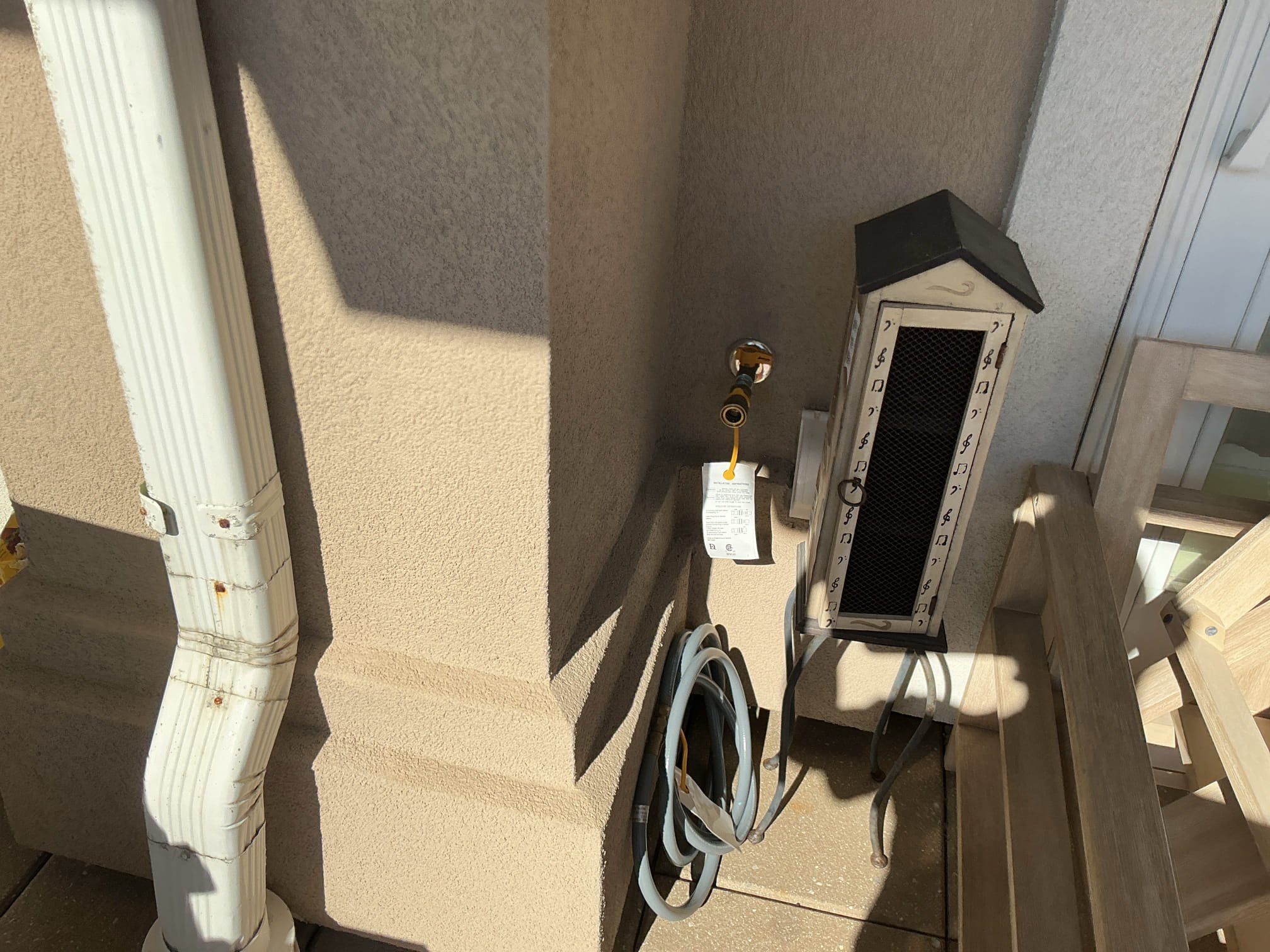 We had ran a gas line for the grill over a month ago, we arrived today to hook up the quick disconnect. I tightened down all my connections and turned the gas cock on at the house and there is no gas coming through. I called the technician that did the install and he stated there is another valve inside the home that was installed for inspection purposes. Client is aware that I can not turn the gas on to the grill since no one is home. I can not check for leaks either at this time.