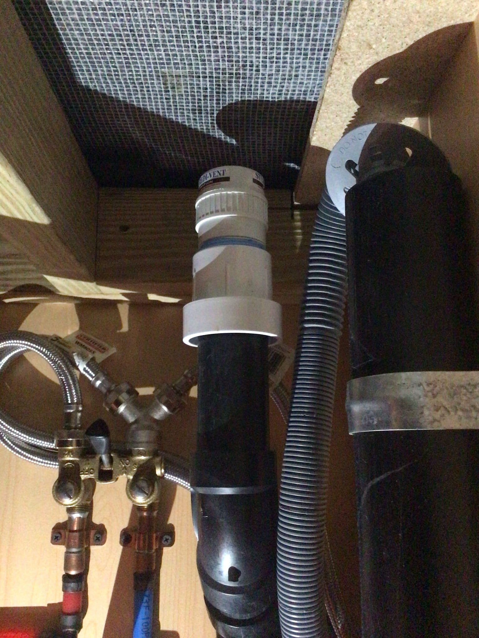 Arrived on call client stated thier washing was backing up when in use and the sink would fill up when in use. Upon inspection I took the Studor vent off and the water immediately dropped. When putting a new Studor vent on the water would still fill up. Snaked the laundry sink and when done I put the new Studor vent on and the laundry sink and washing machine are now draining as they should.