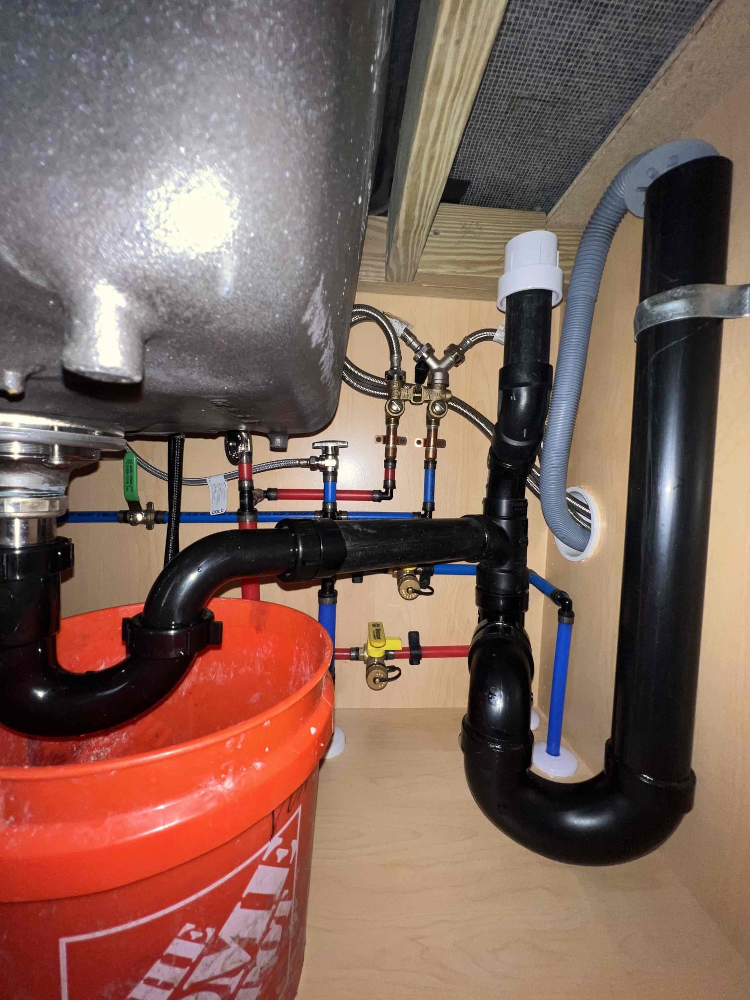 Arrived on call client stated thier washing was backing up when in use and the sink would fill up when in use. Upon inspection I took the Studor vent off and the water immediately dropped. When putting a new Studor vent on the water would still fill up. Snaked the laundry sink and when done I put the new Studor vent on and the laundry sink and washing machine are now draining as they should.