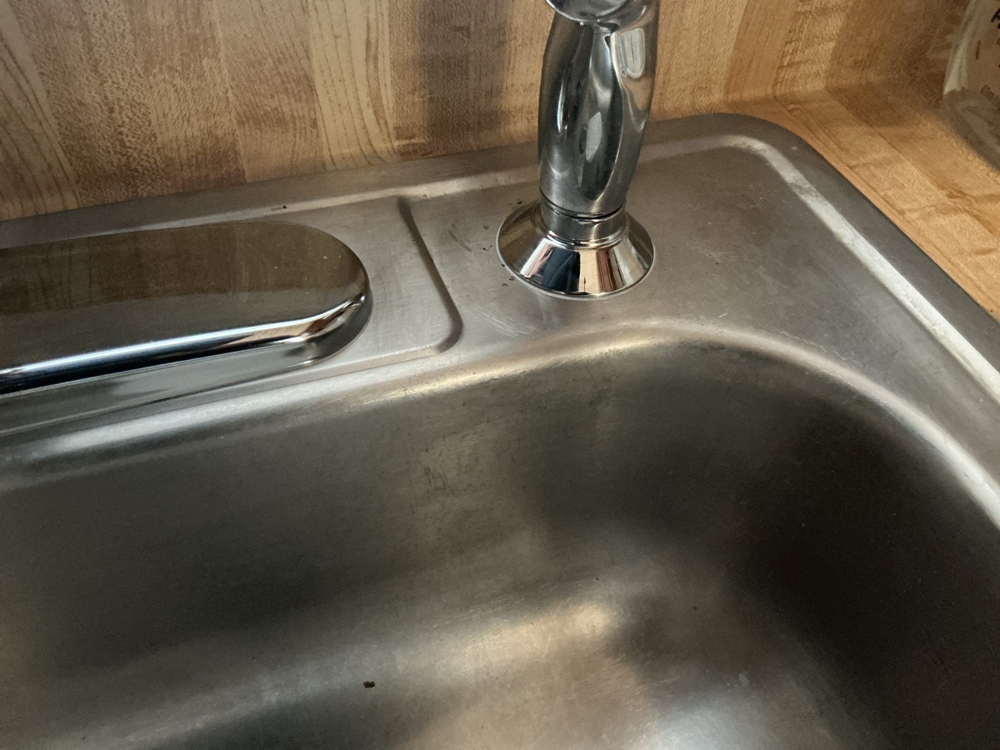 We had recently had preformed an annual plumbing inspection, at the time of inspection I replaced the washing machine valves, also tightened tubular connection under kitchen sink. We arrived because client thought there was a leak under their kitchen sink, after a thorough evaluation I discovered is actually coming from the deck plate of the faucet. If water touches the faucet it leaks from underneath. For today I placed caulking around all the trim and deck plates to insure a water tight seal. I advised to the client if it keeps leaking replacement of faucet would be recommended. If client calls back to replace faucets I will credit today’s diagnostic fee towards the work. I caulked around bathroom faucet as well as per the client. 