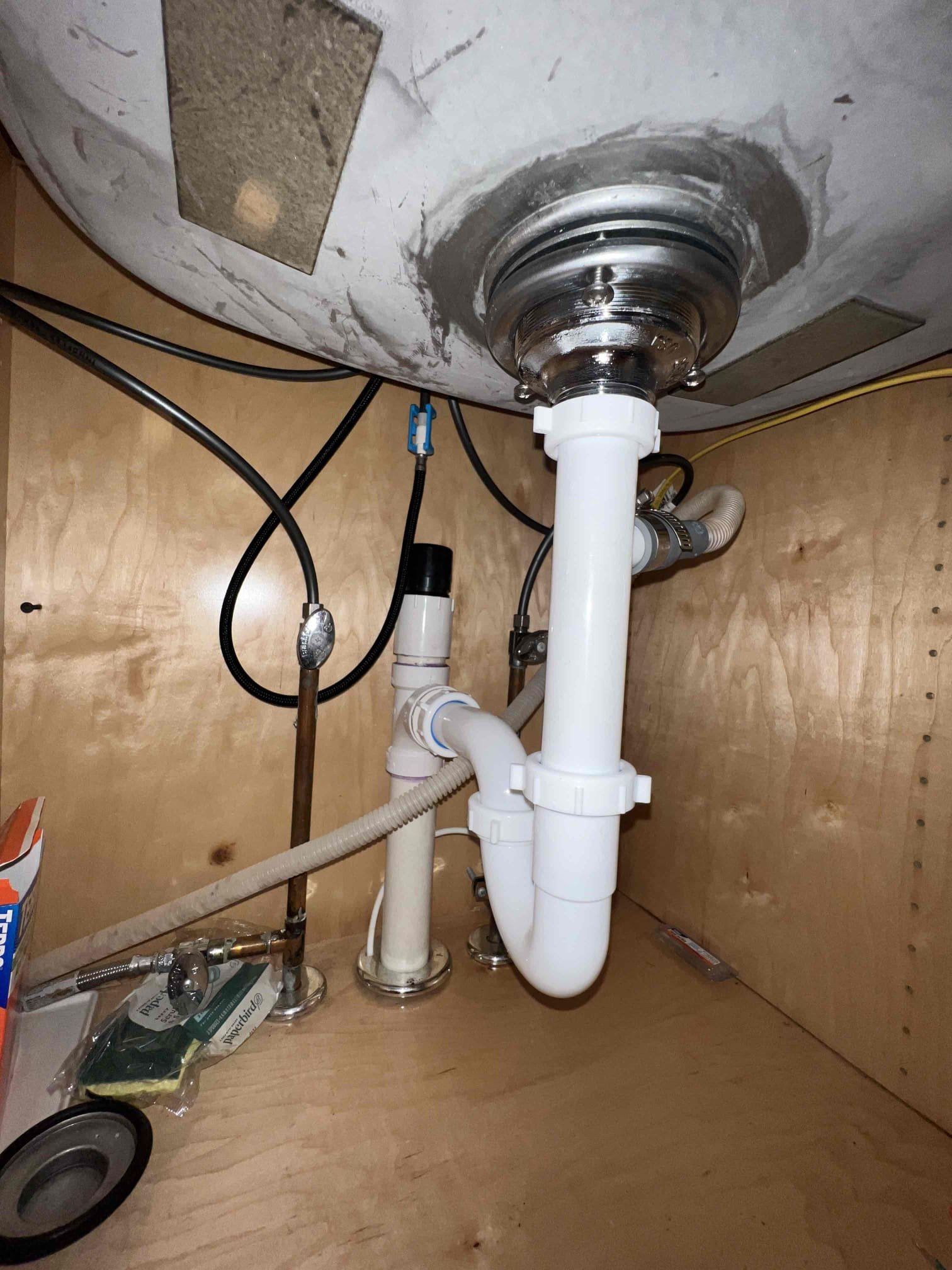 Arrived on site to a clogged kitchen sink. Upon inspection the sink was full and client wasn’t sure if the kitchen drain was clogged or the garbage disposal. Pulled P-trap apart and the sink was still full. Tenants stated they did not like the disposal and never use it. Landlord agreed to remove the disposal. After removing the disposal I put a new Kohler basket strainer, 3/4 dishwasher tailpiece and P trap. Ran hot water when done and there are no leaks. Kitchen sink is draining as it should. Recommend Tower bridge electric to remove switch under kitchen sink (732)-703-5144. Arrived on site to a clogged kitchen sink. Upon inspection the sink was full and client wasn’t sure if the kitchen drain was clogged or the garbage disposal. Pulled P-trap apart and the sink was still full. Tenants stated they did not like the disposal and never use it. Landlord agreed to remove the disposal. After removing the disposal I put a new Kohler basket strainer, 3/4 dishwasher tailpiece and P trap. Ran hot water when done and there are no leaks. Kitchen sink is draining as it should. Recommend Tower bridge electric to remove switch under kitchen sink (732)-703-5144.