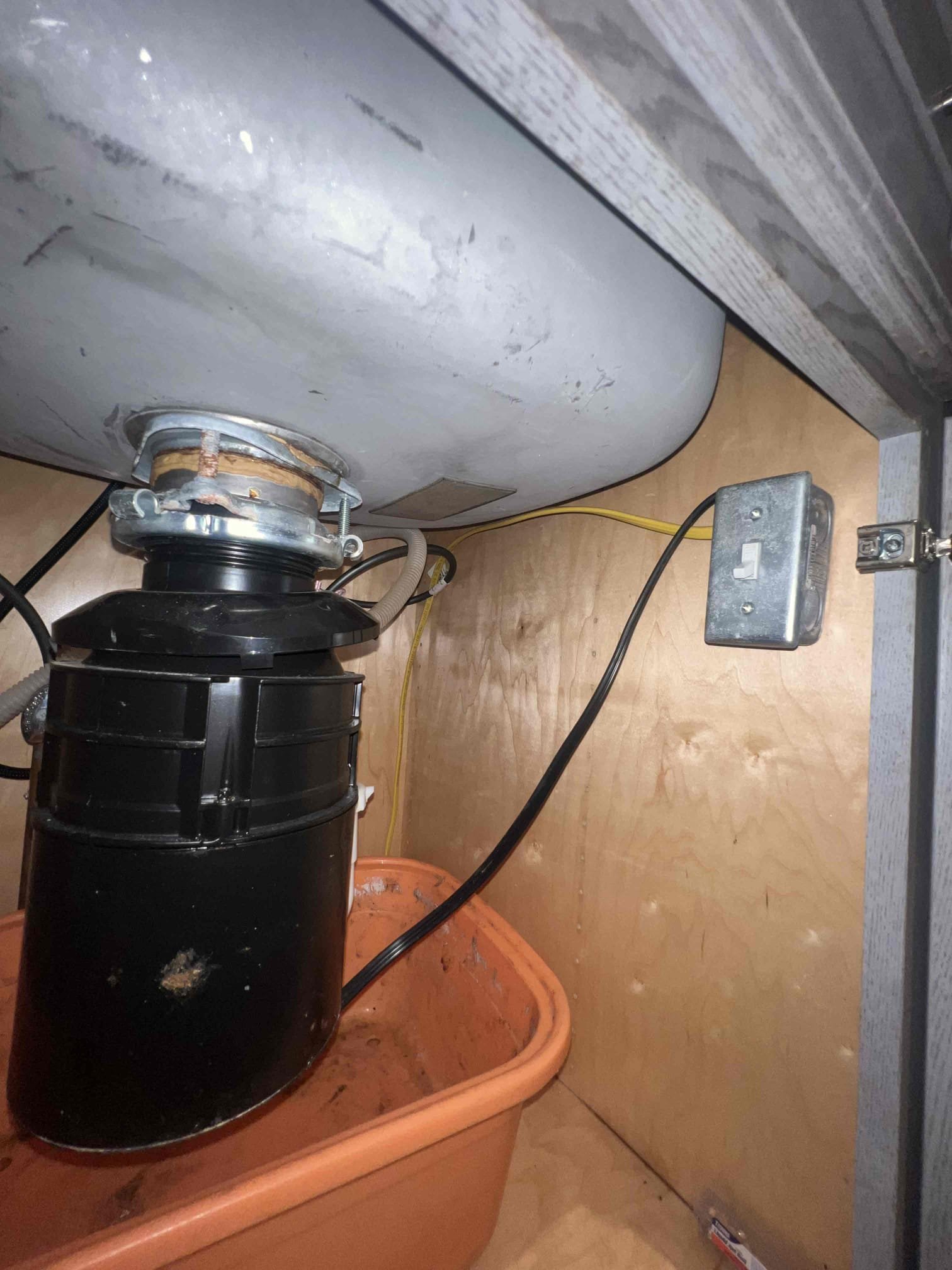 Arrived on site to a clogged kitchen sink. Upon inspection the sink was full and client wasn’t sure if the kitchen drain was clogged or the garbage disposal. Pulled P-trap apart and the sink was still full. Tenants stated they did not like the disposal and never use it. Landlord agreed to remove the disposal. After removing the disposal I put a new Kohler basket strainer, 3/4 dishwasher tailpiece and P trap. Ran hot water when done and there are no leaks. Kitchen sink is draining as it should. Recommend Tower bridge electric to remove switch under kitchen sink (732)-703-5144. Arrived on site to a clogged kitchen sink. Upon inspection the sink was full and client wasn’t sure if the kitchen drain was clogged or the garbage disposal. Pulled P-trap apart and the sink was still full. Tenants stated they did not like the disposal and never use it. Landlord agreed to remove the disposal. After removing the disposal I put a new Kohler basket strainer, 3/4 dishwasher tailpiece and P trap. Ran hot water when done and there are no leaks. Kitchen sink is draining as it should. Recommend Tower bridge electric to remove switch under kitchen sink (732)-703-5144.