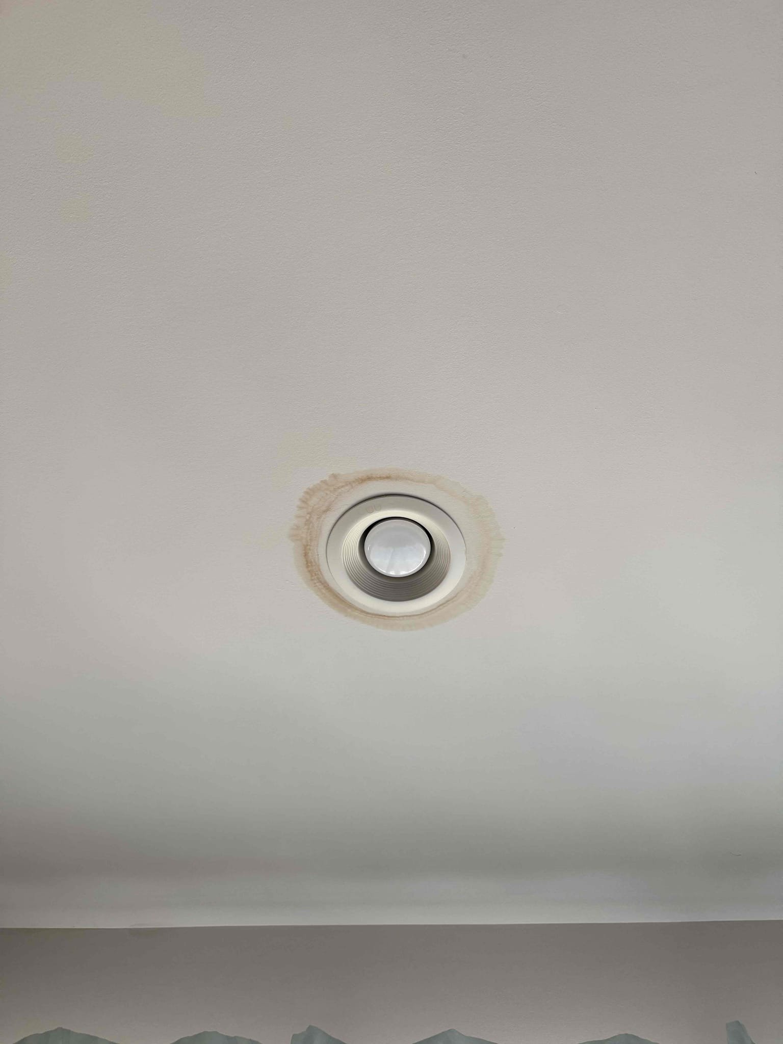 Customer stated that they had a leak in their living room ceiling and believe it’s from the bathroom.  After inspecting we went to the master bathroom and inspected the shower,  Myguy plumbing noticed a gap in the shower doors and the shower hand held is leaking. Myguy plumbing gave customer options to perform a shower pan test. Or to cut open the ceiling below to see what is going on, for today customer would like to get a grout company come out and re-seal the shower, if customer still sees water marks or drips after shower is grouted. Myguy plumbing advised customer to call us back.