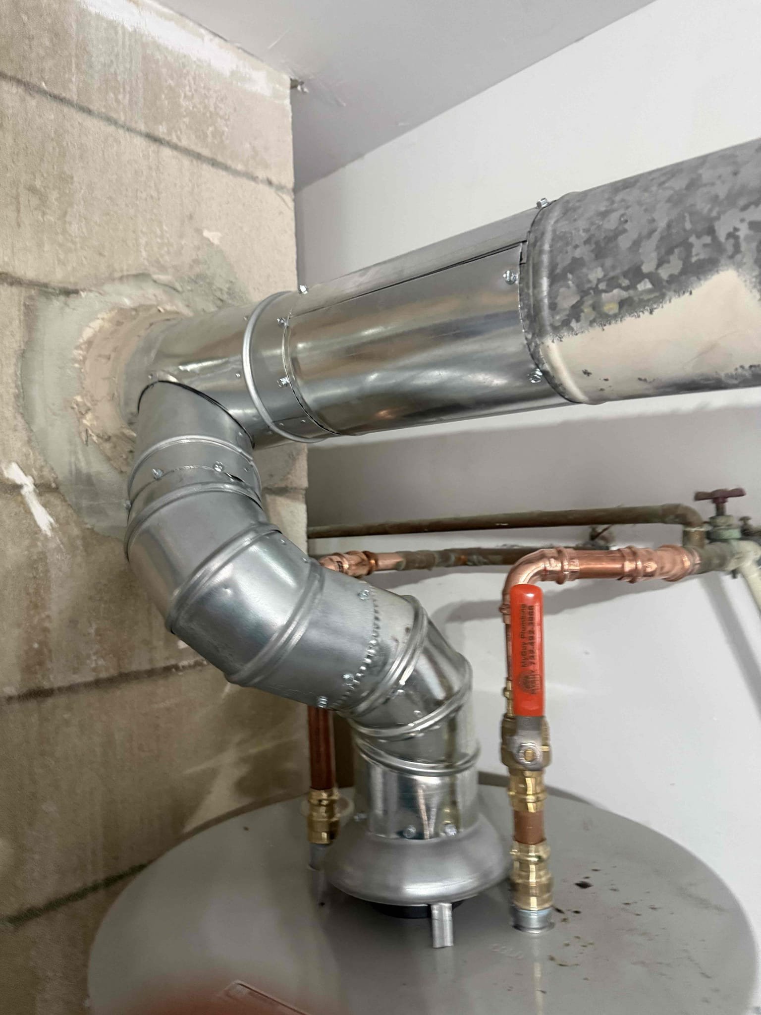 New water heater, 1 main shut off valve with membership
Began draining old water heater, then cut all connections to it removed heater. Brought new water heater in, made up all connections to new heater. We change old valve with new ball valve at main going towards house. 
Customer got wrong vanity top as the old 1 is towards the left and the new is centered so it can’t be placed at this time. We will be coming back at a later time when customer gets new base for vanity. But once everything was said and done we checked for leaks, there are no leaks at this time.