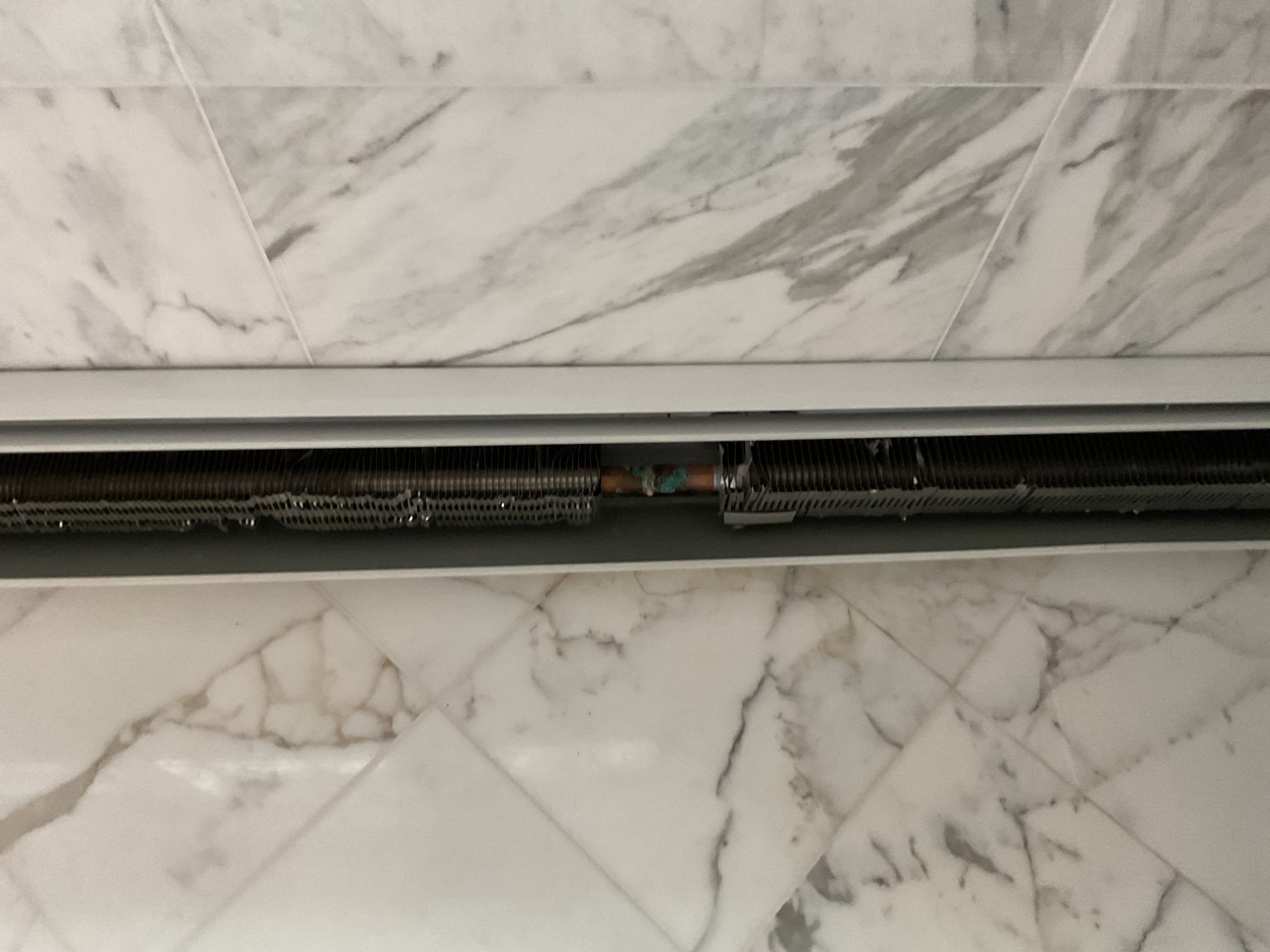 Arrived on site customer stated that they are getting consistent heat on the spare bedroom zone 4 even with the thermostat off and they also have a small leak on the bathroom baseboard in master bedroom. Upon inspection found that the zone valve head was stuck open and needed to be replaced. Upon inspection of the leak found that we will need to install a set up on the supply for the boiler to blow compressed air throughout the loop because we are unable to drain by gravity. Replaced zone valve head and everything appears to be in working order. We will be returning tomorrow morning to drain down system and repair leak on the baseboard. Collected payment for today’s work.