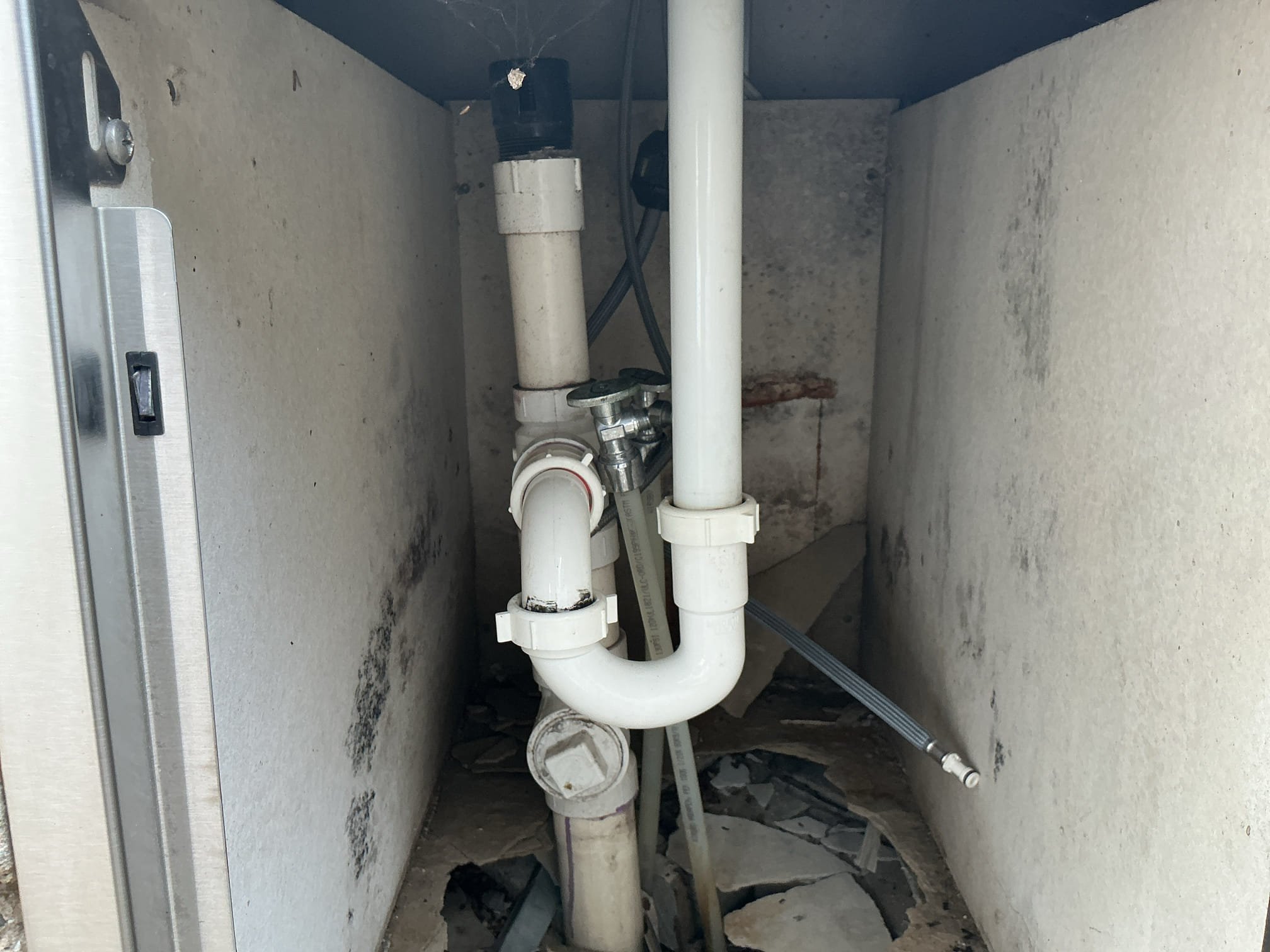 Arrived to the home for winterization of the outdoor sink.
Located shut off valves and boiler drain valves above water heater.
Introduce compressed air of both hot and cold water piping.
Blew out system and emptied all water out of the pipes.
Disconnected supply lines from faucet and left all valves on under the sink.
Poured antifreeze down the drain as well.

Kitchen sink is now winterized