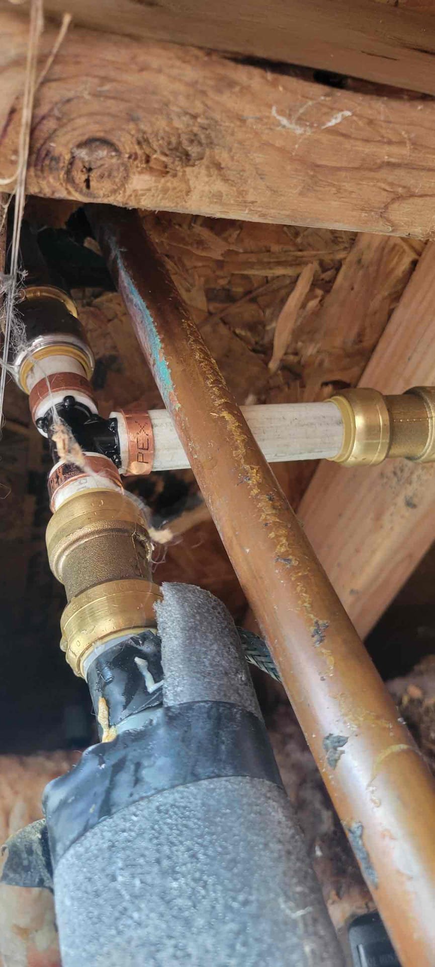 Arrived to the home, water to the trailer is currently off at this time. Client states active water leak under the trailer. I turned the trailer on and discovered that the PolyB tee fitting has a split resulting in the leak. I provided options for repair and customer would like to go through with the work quoted.

Cut out PolyB tee fitting.
Adapted existing PolyB pipe using sharkbite connectors.
Secured all my connections and turned the water back on to check for leaks.
There are no leaks at this time.

*Customer is aware that due to the quality of the PolyB piping, MyGuy Plumbing can not provide any warranty on the sharkbite connectors used to make the appropriate repairs.