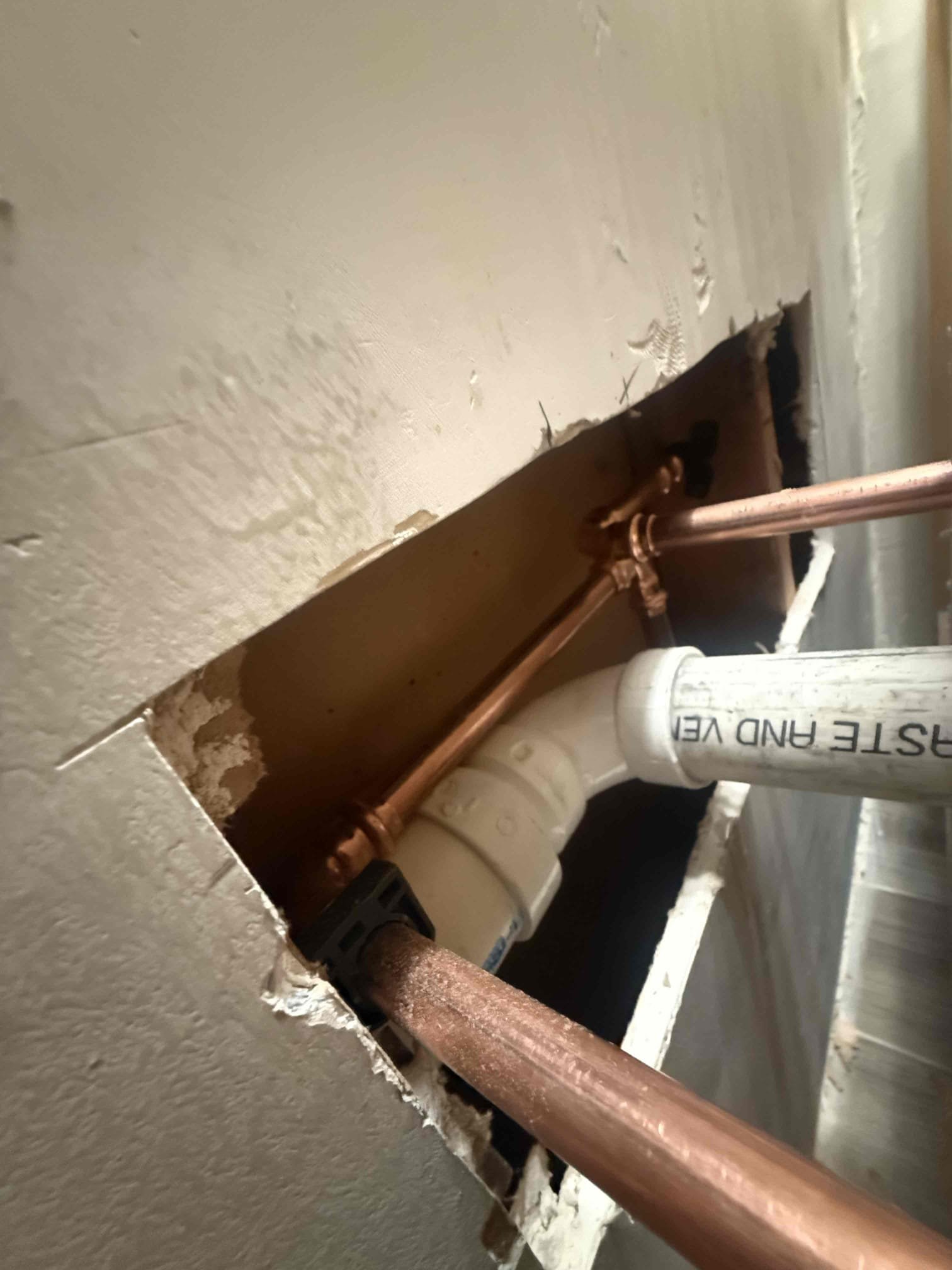 Arrived to home to install customer supplied vanity. Upon inspection found that drainage and water would need to be moved to make vanity fit as best as possible. MyGuy installed customer supplied vanity, customer supplied widespread faucet(reused) and vanity countertop. Did not remove backsplash because customer wanted to keep it there. MyGuy supplied faucet supply lines and also drainage fittings, copper fittings for faucet and straps to secure lines. While installing, wall was not perfectly square causing a slight increase in gap width on right side of vanity. We silicone countertop to vanity base after securing base to wall studs. Also used white caulk to fill gaps. Tested for leaks on all work and there are no leaks at this time.