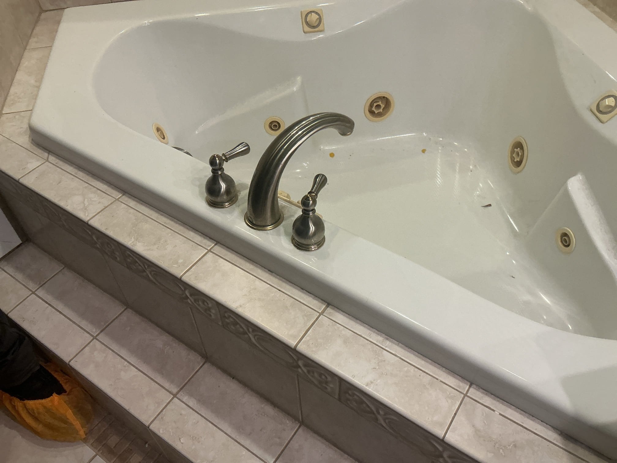 Arrived to the home, customer states they have an existing jacuzzi bathtub with jets that the water piping to it is broken resulting in a leak. Customer had other plumbers come out to address this issue, one plumber said that the whole tub needs to be removed while the other stated that can do something from the crawlspace. There is an access panel about four feet away from the faucet, but that panel is actually meant for the motor for the jets of the tub. Customer does not want to remove the tub and is simply calling for another opinion at this time. I turned the ball valves on for the tub and there are no leaks, once you turn the handles on water is spraying underneath. The faucet has failed and replacement is recommended. I advised to the client to have a tile company remove the tiling, giving me enough accessibility to replace the faucet in the future. After that install an access panel for any future service of the tub. No 59$ 