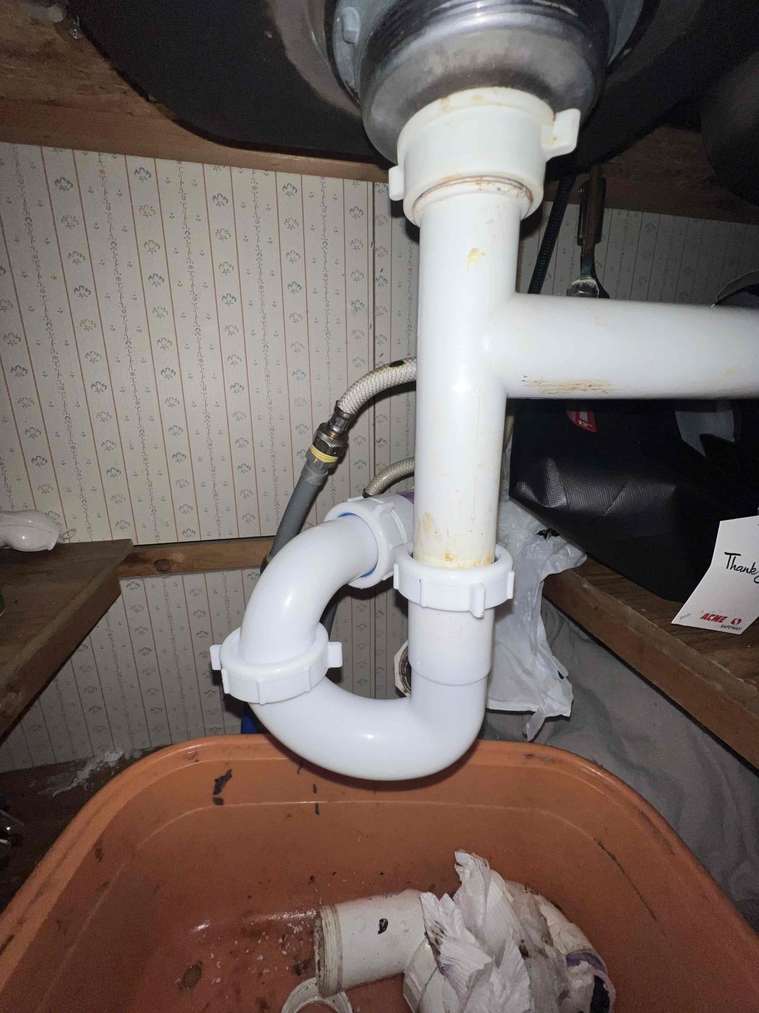 Arrived on site client stated they had a kitchen clog and a leak under the sink. Upon inspection client had a studor vent that was bad and the trap underneath was leaking because it was unable to be inserted all the way in properly. Piped in the trap properly with a tubular trap and replaced the studor vent underneath. Clients stated the kitchen sink drain much better now.