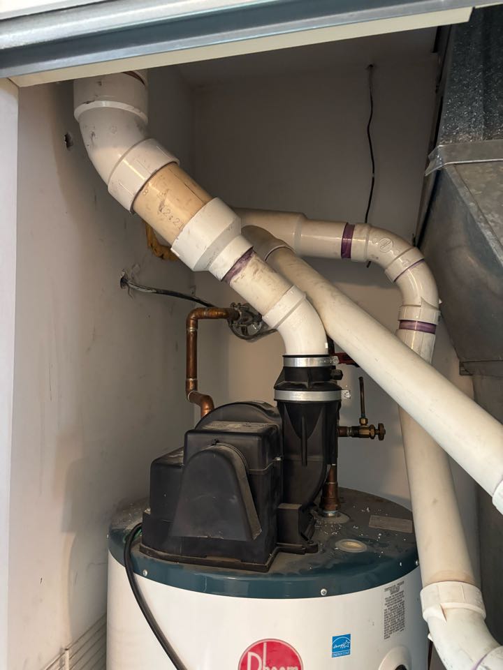 Re-piped PVC exhaust venting on power vent water heater. Cream Ridge, NJ 08514