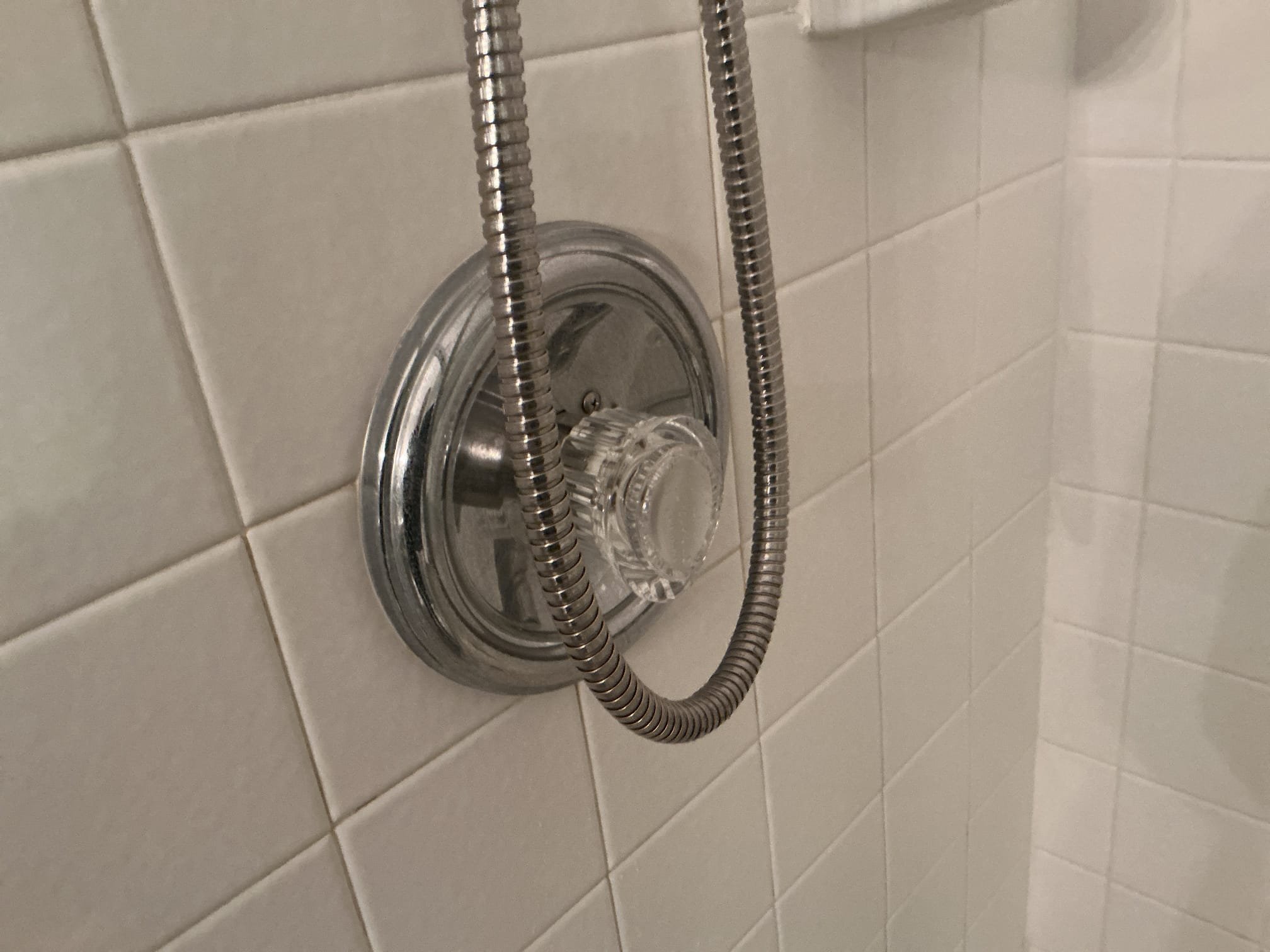 We had recently replaced the Moen posi temp shower cartridge for the client, I arrived today due to the client stating the shower is not turning on or working correctly at all. I disconnected the acrylic handle and discovered that the handle is cracked, resulting in the shower not working correctly. I supplied and installed a new handle for the client at this time. My theory as to why the handle broke, was when putting the shower parts back together, the tech on site, had accidentally sent the set screw to far resulting in the handle breaking. No 59$