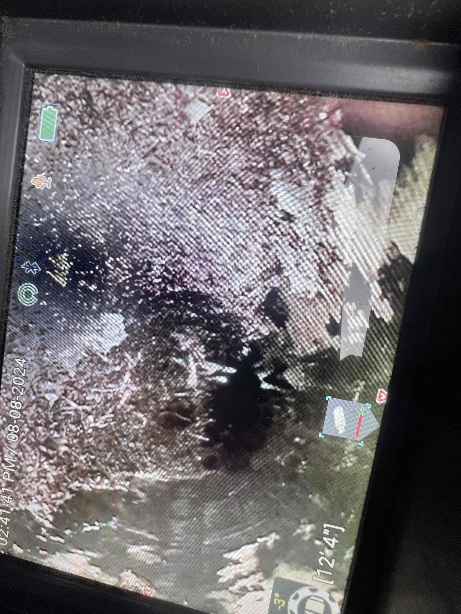 Arrived on site client stated their toilet would back up and not flush. Client has a clean out outside and when we opened the clean out there was water. Snaked the main line through the clean out and found roots and flushable wipes on the cable. Restored flow for today and left estimates to dig and repair sewer main.