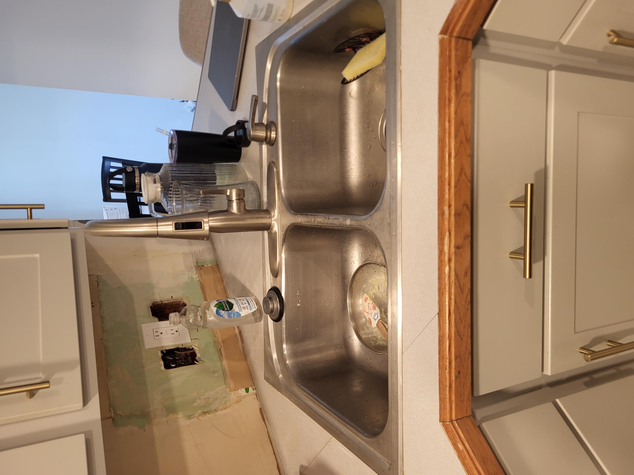 Arrived to the home, customer had recently had their countertops in their kitchen replaced with a new sink and would like up to do the plumbing underneath, customer had already installed the kitchen faucet. Also there is a valve in the laundry room for a utility sink that does not hold water either, when I arrived to the home customer had already shut off the water to the home due to another valve under the kitchen sink not holding water either. I provided options and customer would like to go through with the work quoted and become a member.

Supplied and installed new pvc pipe, fittings, tubular drainage and basket strainer under the kitchen sink.
Supplied and installed new one new shut off valve under the kitchen sink as well.
Secured all my connections and pressure tested the sink to check for leaks.
There are no leaks at this time.

Supplied and installed two new shut off valves under the utility sink location.
Capped off sewer line to prevent sewer gases from entering the home.
S