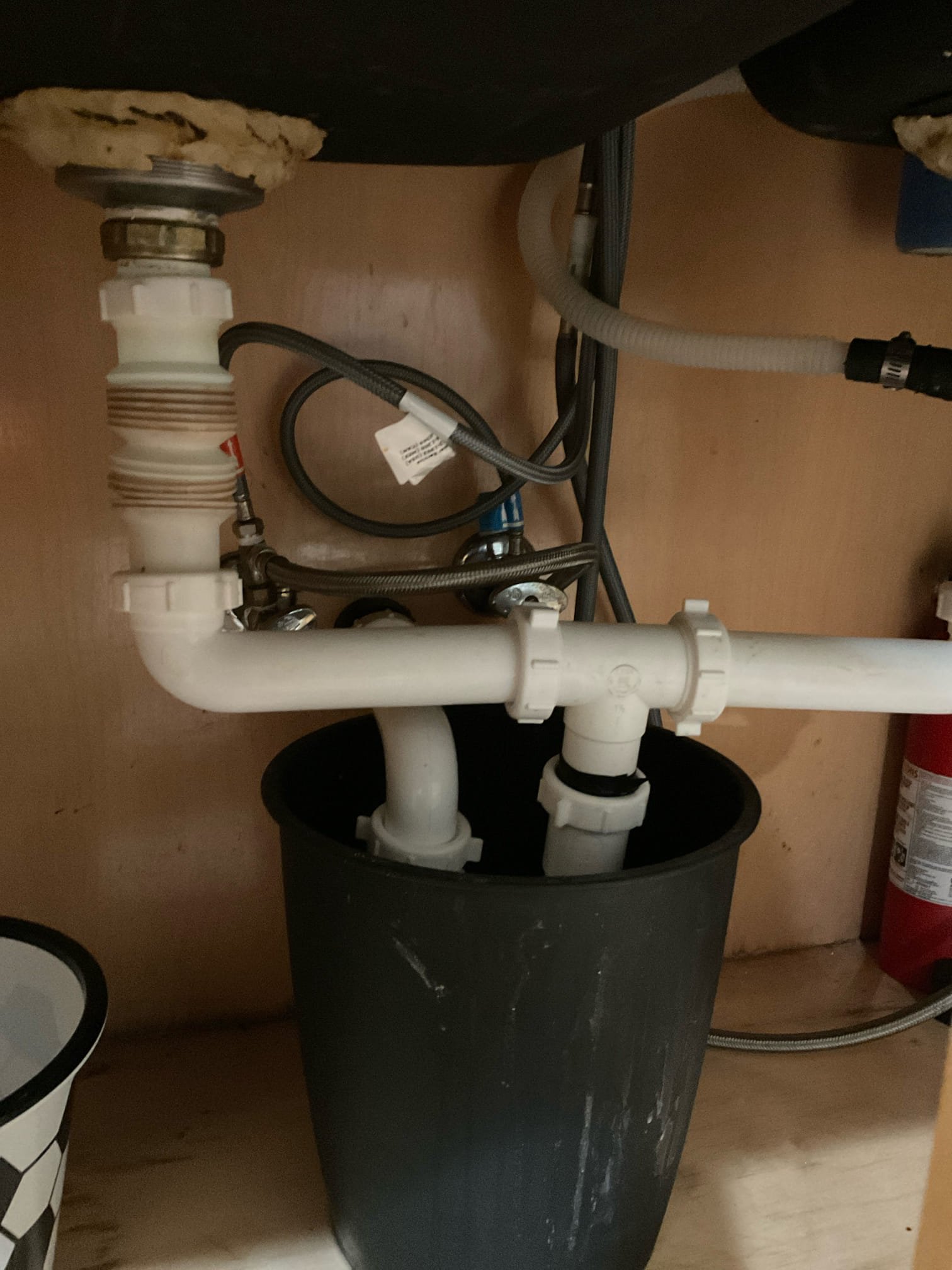 Arrived on site client stated that their kitchen sink was backed up. Upon inspection client also had a leak that he attempted to repair under the kitchen sink himself. Client stated they also attempted to snake it themselves. Gave options to hydro jet the sink drain and to fix the drainage underneath the sink. Hydro jetted and snaked the kitchen multiple times and when done we repipe the kitchen drainage and tested for leaks and sink drain flow. There are no leaks at this time and the sink is draining as it should. 

Cause of clog appeared to be a bad grease blockage.