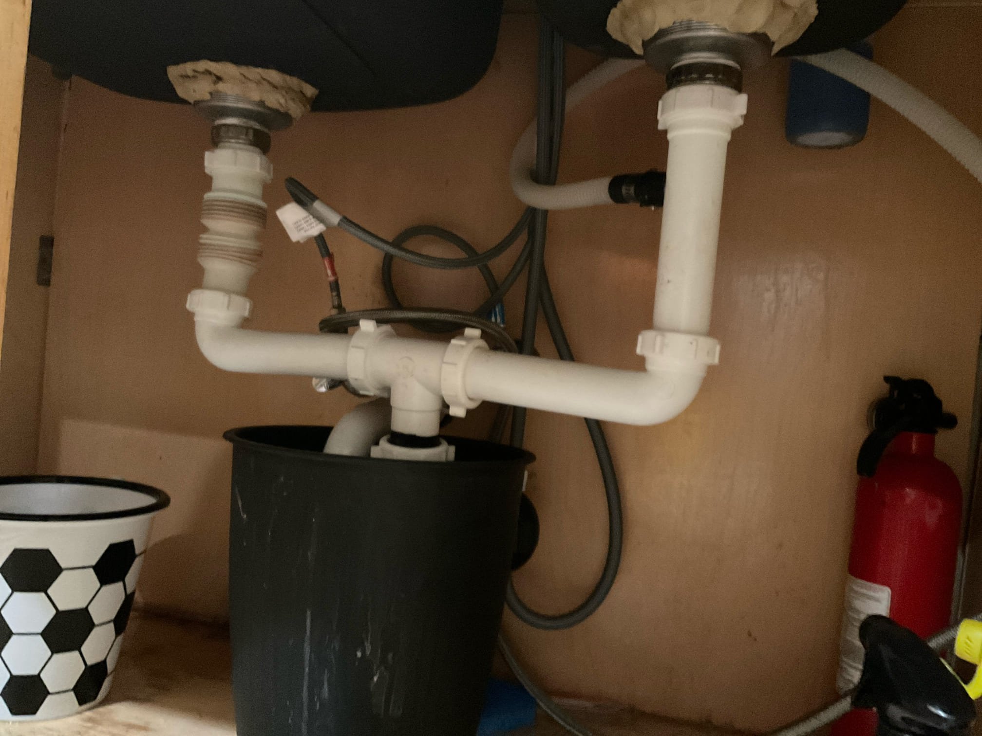 Arrived on site client stated that their kitchen sink was backed up. Upon inspection client also had a leak that he attempted to repair under the kitchen sink himself. Client stated they also attempted to snake it themselves. Gave options to hydro jet the sink drain and to fix the drainage underneath the sink. Hydro jetted and snaked the kitchen multiple times and when done we repipe the kitchen drainage and tested for leaks and sink drain flow. There are no leaks at this time and the sink is draining as it should. 

Cause of clog appeared to be a bad grease blockage.