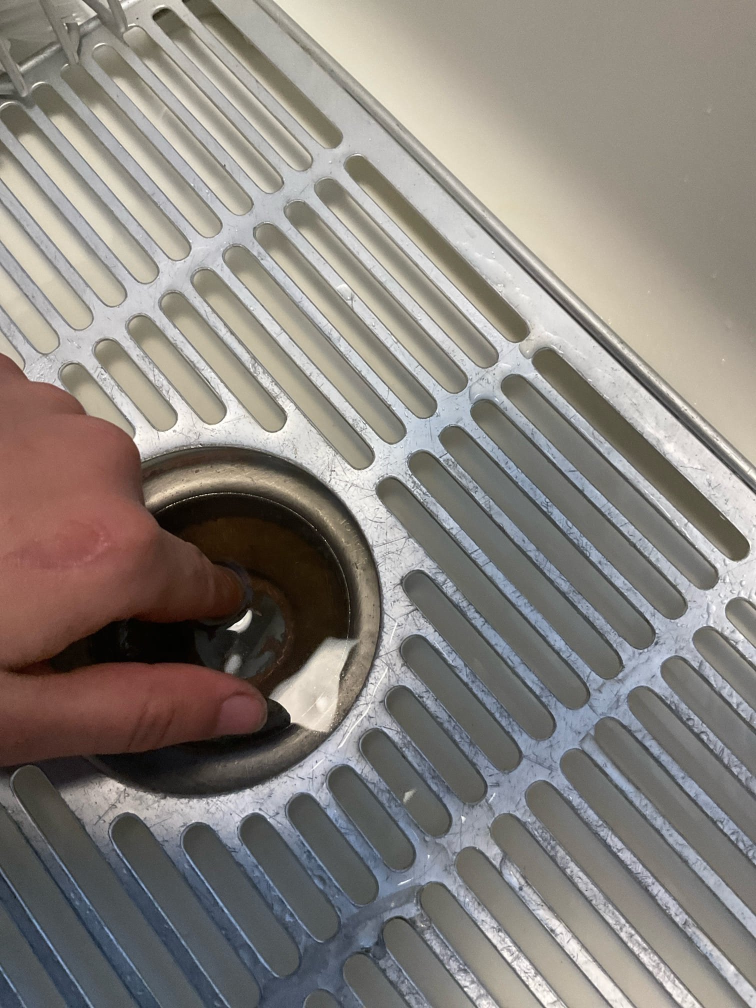 Arrived on site and client stated their kitchen sink was very slow drain and the basket strainer had broke. Left options to either snake or hydro jet the kitchen line and to replace their existing basket strainer. Hydro jetted the kitchen line and replaced the basket strainer with a chrome Kohler basket strainer. Clog appeared to be due to grease. After hydro jetting and installing the basket strainer we filled the sink up multiple times with hot water. There are no leaks at this time and the kitchen sink is now draining as it should.