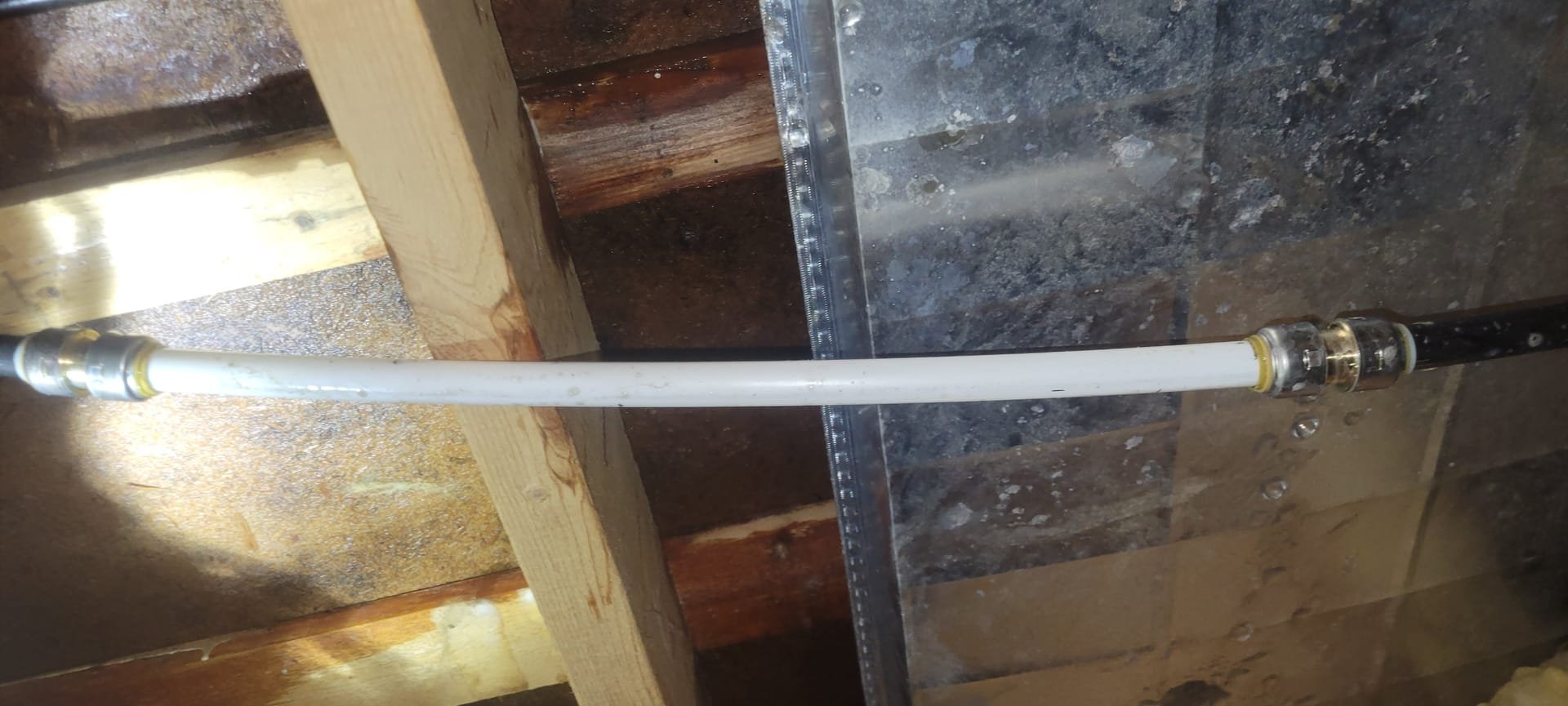 A few weeks ago we had cut out and removed a damaged PolyB line, we arrived today due to the client stating something is still leaking under the trailer. The first repair was made on the cold riser for the kitchen sink, today’s leak is is a different spot under the trailer but this time on the hot side. I provided an options for repair and client would like to go through with the repair.

Cut vapor barrier to access the piping. 
Cut out damaged PolyB line under the trailer.
Adapted to PolyB using sharkbite couplings.
Secured my connections and turned the water back on to check for leaks.
There are no leaks at this time.

*Client is aware that MyGuy plumbing can not offer a warranty due to the integrity of the PolyB piping.
*The leak found today was located between the floor joists and the duct work, it appears that the leak was caused by the piping rubbing up against the duct work, that is just a theory at this time.
*I will leave an estimate to replace all the PolyB under the trailer.