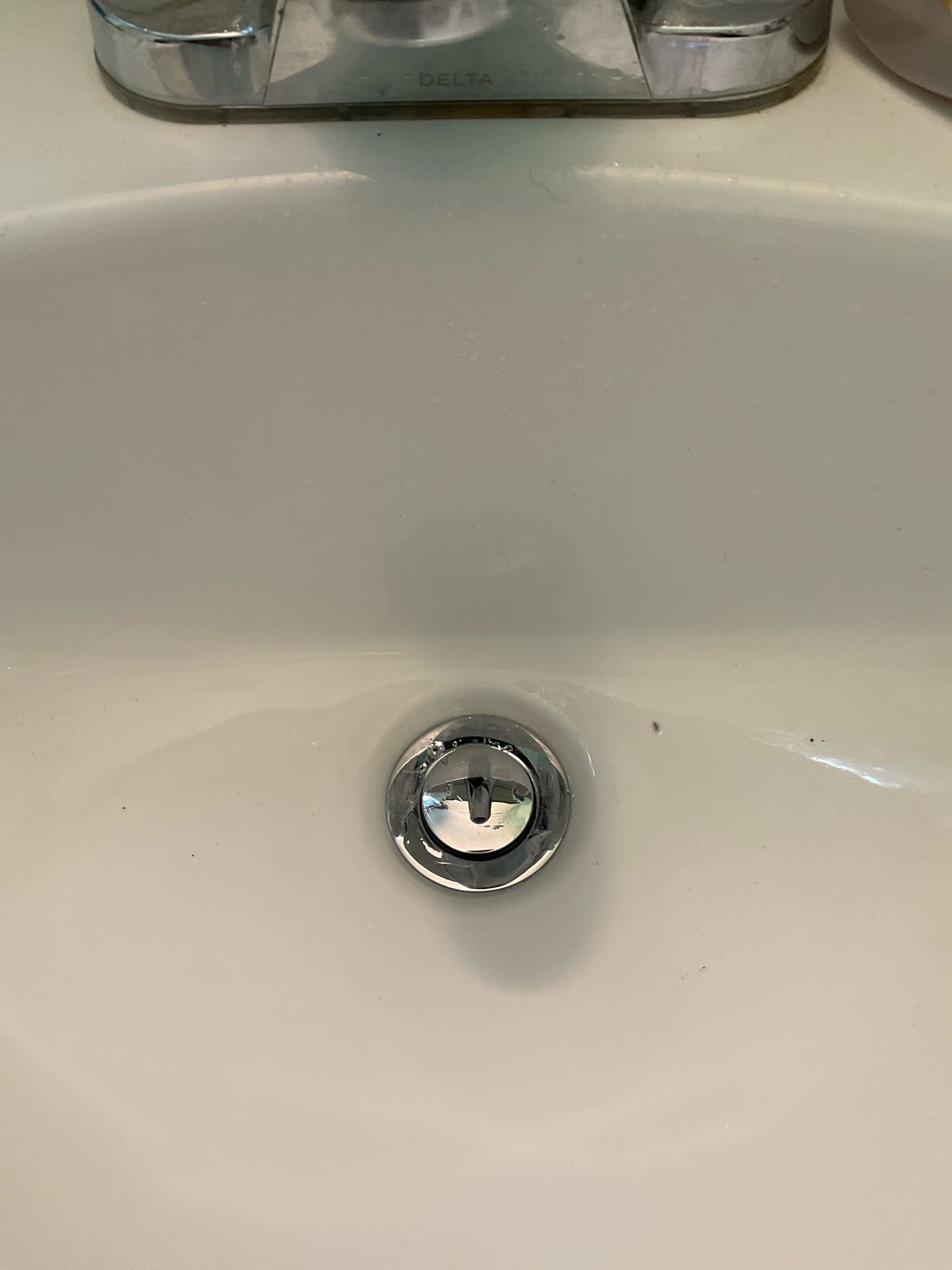 Arrived on site to replace leaking pipe up assembly. Replaced pop up assembly with a chrome Wolverine brass pop up assembly. When done I tested for leaks with hot water. There are no leaks at this time.