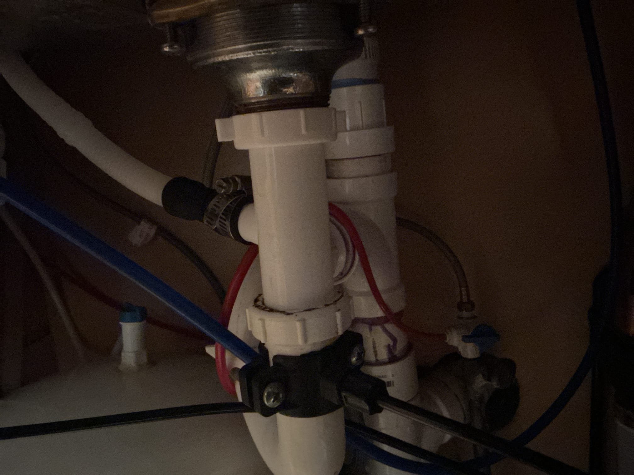 Arrived back to the home, at the first time of the estimate, a line item was on there for replacement of Dw tailpiece. At the time the work was completed, I had forgot to replace the tailpiece. We arrived today to replace the tailpiece for the client. I replaced the tailpiece and pressure tested the sink to check for leaks. There are no leaks at this time. Client would like a quote to relocate how the discharge is for the wash out for the existing well system, will leave a quote for that work to be completed.