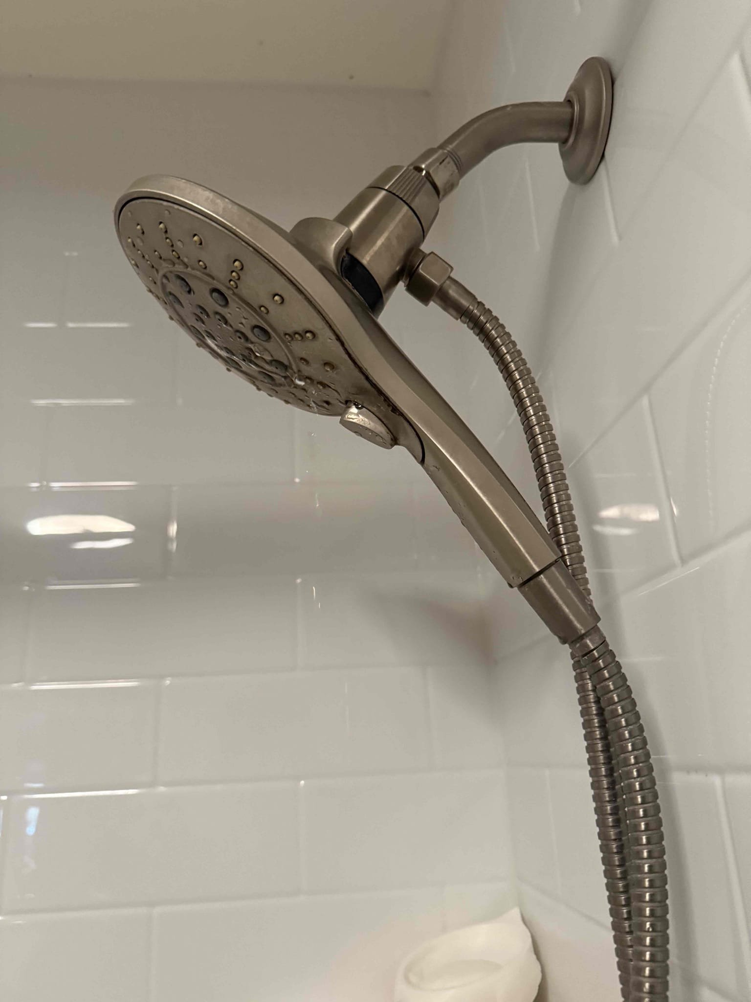 Arrived at customers home for a leaking tub spout and for the shower head leaking while tub spout is on. After diagnosing the problem and presenting options we replaced the tub spout. We installed a brand new brushed nickel tub spout and re caulked. After replacement the tub spout is working as intended.

While the tub spout is on, there is still water coming from the shower head. This is most likely due to the tub spout being run in PEX, which is incorrect. I left the customer with options if they choose to rectify this problem in the future.