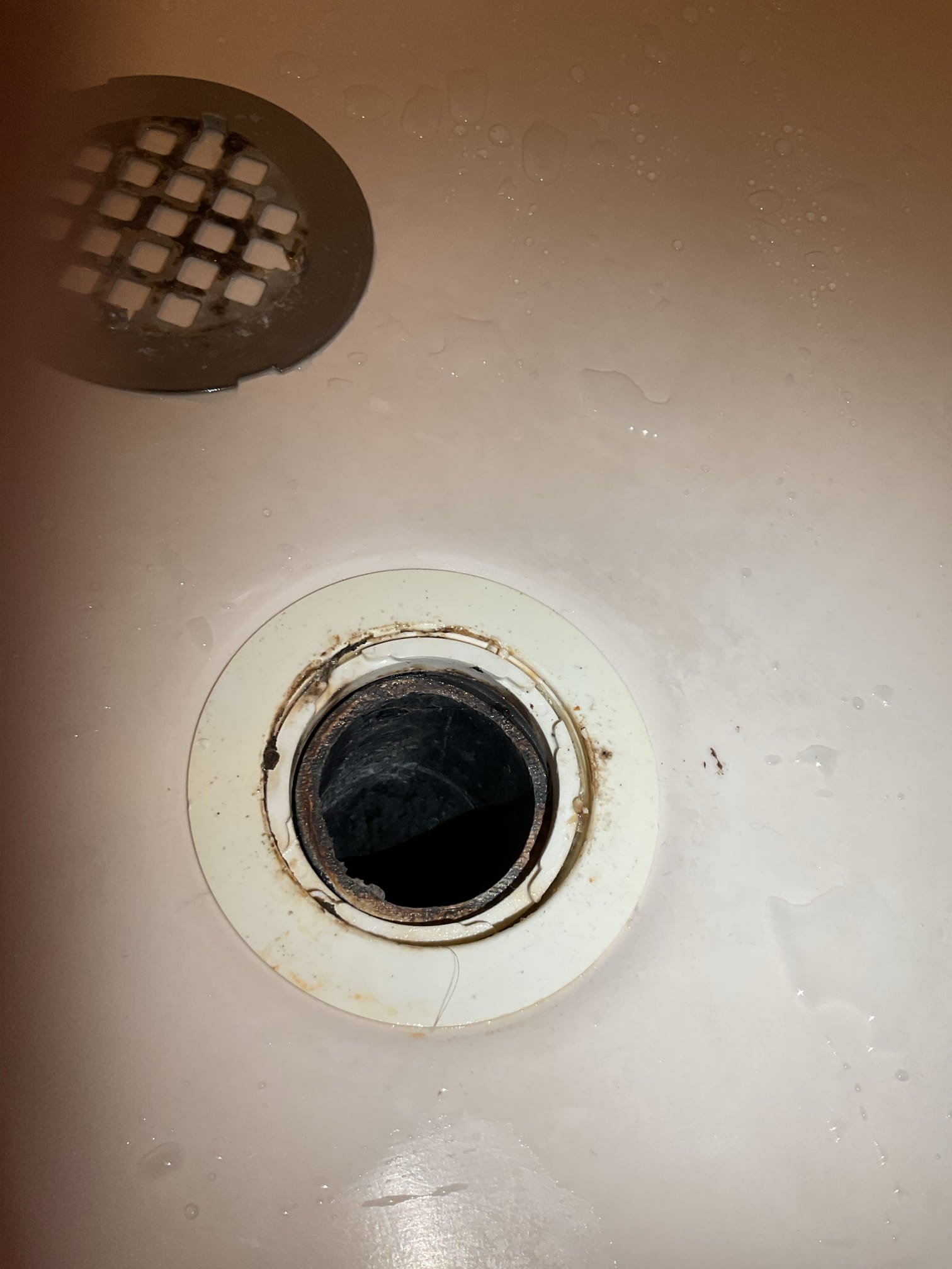 Arrived on site customer stated that they had a clog in the shower and removed and now they are hearing a gurgling sound occur when the heat runs. Upon inspection found that the condensation discharges into the shower drain line and that is the noise that they are hearing in the shower probably never noticed due to the massive amounts of hair they pulled out. Also found a leak on the shower strainer and found that the gasket and nut for it are not set properly gave options to replace vs. repair and customer would like to repair shower strainer remove not gasket reinserted pipe to strainer. Tested all work and everything appears to be working order and there appears to be no leaks at this time collected payment. No warranty on repair.