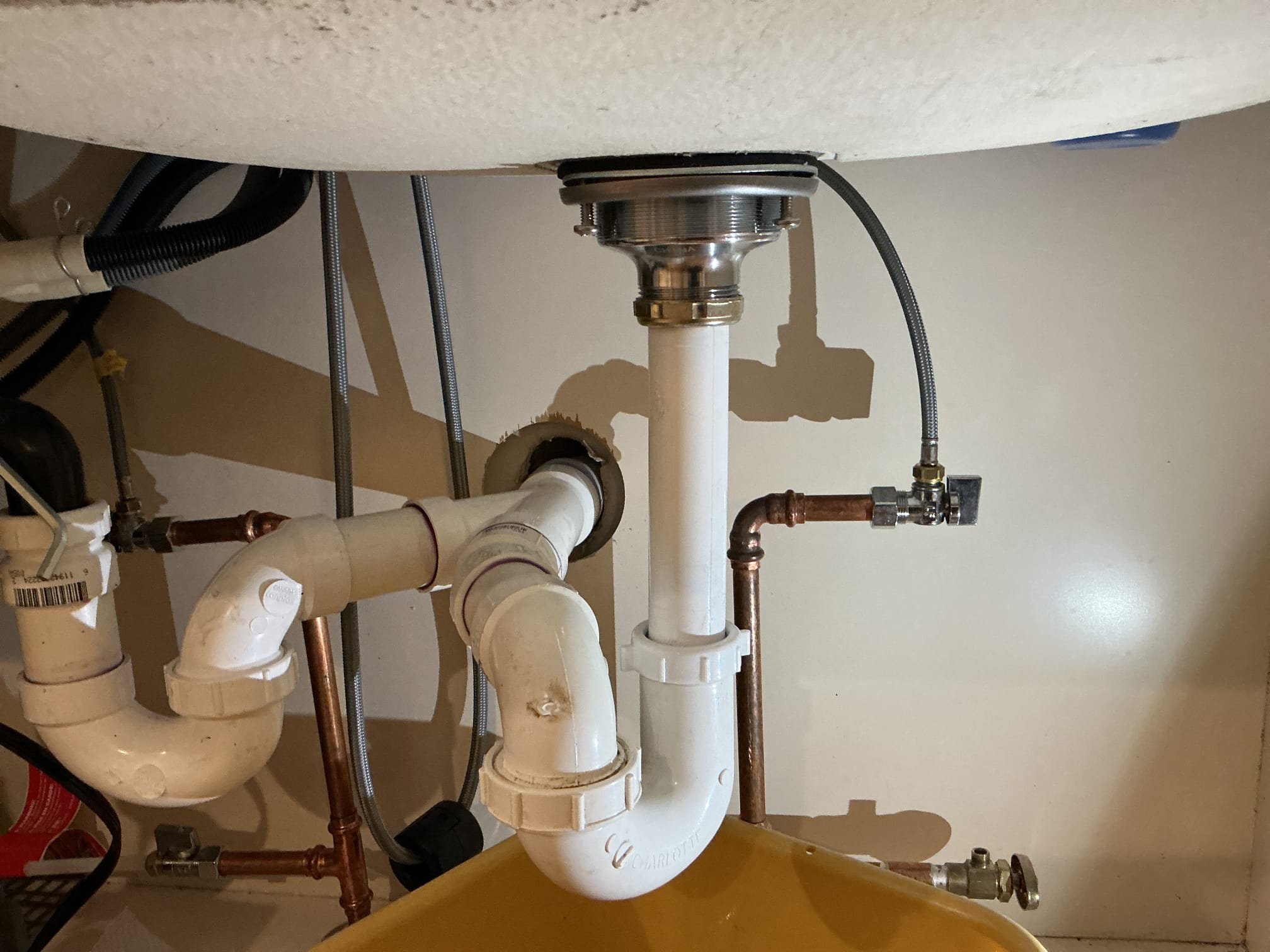 We had recently installed a new basket strainer under the kitchen sink, we arrived today due to the client stating there is a leak coming from it. I ran the faucet and discovered that the leak is not from the strainer but from the connection to the flanged tailpiece. I installed a new top hat washer and pressure tested the sink 3 times to check for leaks. There are no leaks at this time.