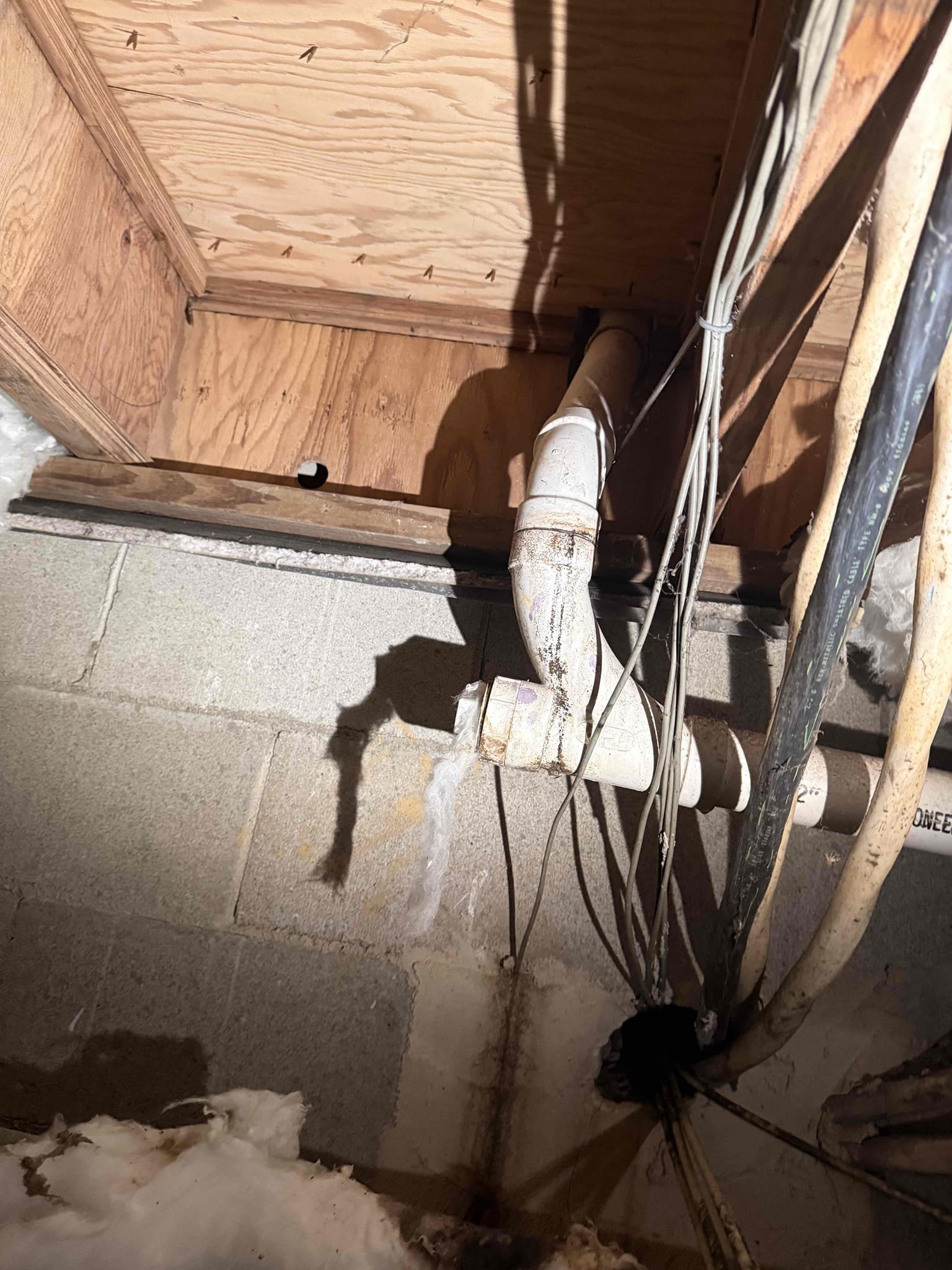 Hardness 6
PH 7.6
Chlorine .5ppm

Arrived to the home, customer has a new fridge that they have installed and would like us to install an ice maker shut off valve and run new tubing for it in the crawlspace. I went into the crawlspace and discovered a leaking drain from the kitchen. I provided option for the repairs and the client would like to go through with the work quoted.

Drilled hole through kitchen to run the new line.
Turned off water to the home and drained the system.
Supplied and installed new shut off valves under kitchen sink one for faucet and the other is the ice maker.
Secured those connections and turned the home back on to check for leaks.
There are no leaks at this time.
Connected tubing and purged the system and fridge of air.

Cut out broken drain line in crawlspace.
Supplied and installed new pvc pipe and fittings.
Secured those connections and ran water to check for leaks.
There are no leaks at this time.