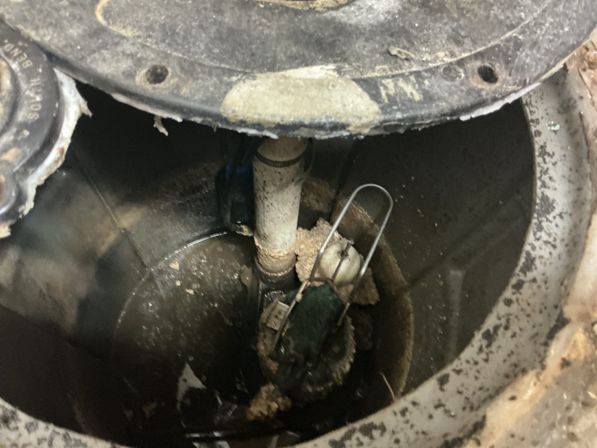 Arrived back to figure out issue with the sewer ejector. Client is stating that whenever they flush the toilet in the basement one time the pump goes off. I removed the lid and discovered scum and debris stuck on the float not allowing it to drop all the way down. I broke up the scum and removed what I could from the basin. I then added silicone in between the lid and basin, screwed the lid back in, and added more silicone around the whole basin. Ran fixtures and the pump is no working properly.