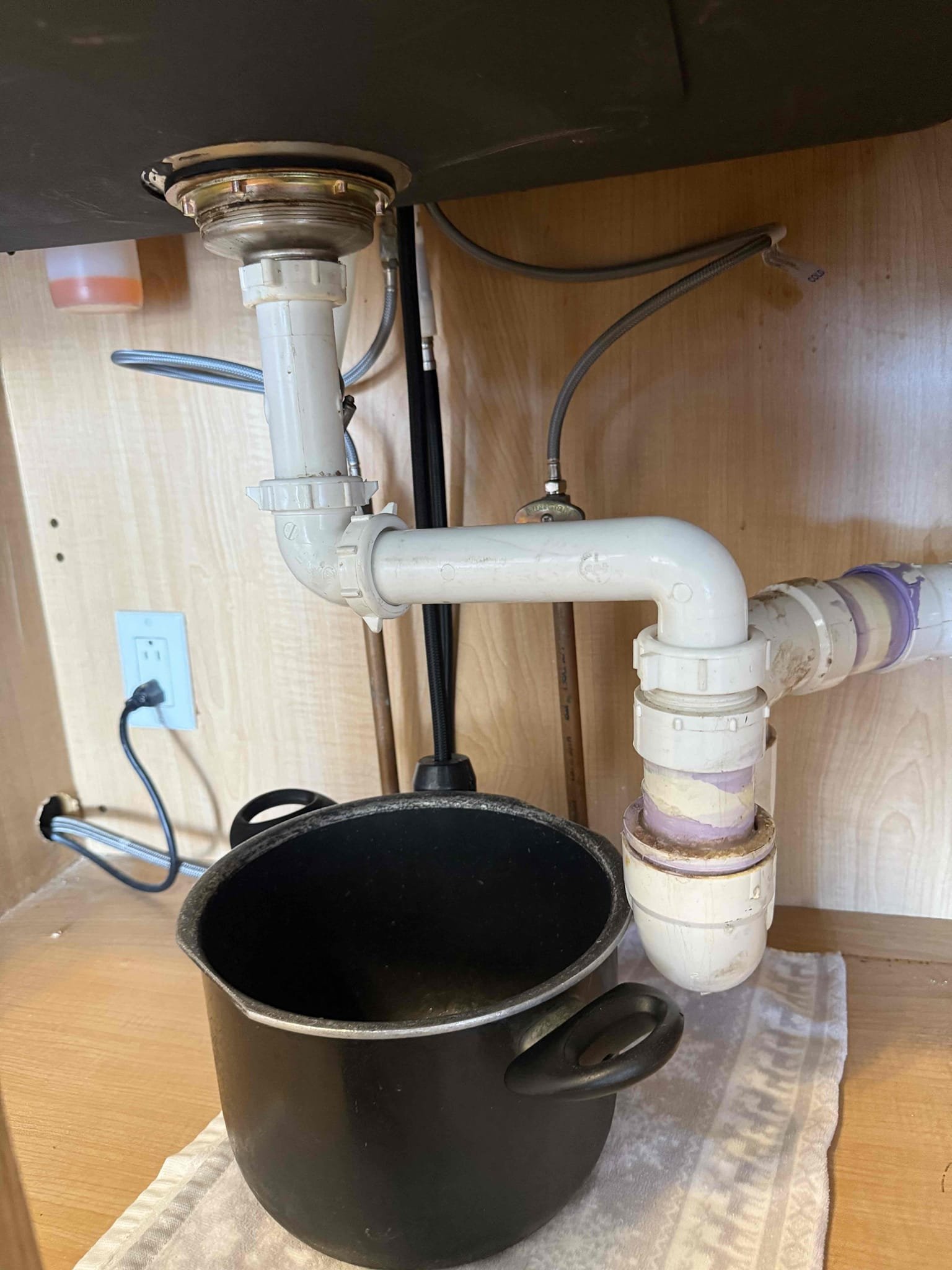 Arrived on site customer stated that when they ran there kitchen sink it leaks. After inspecting we found that the trap arm is leaking, myguy plumbing gave customer options to Repipe drainage under kitchen sink to make it proper, or to just replace the trap arm. customer declined work.