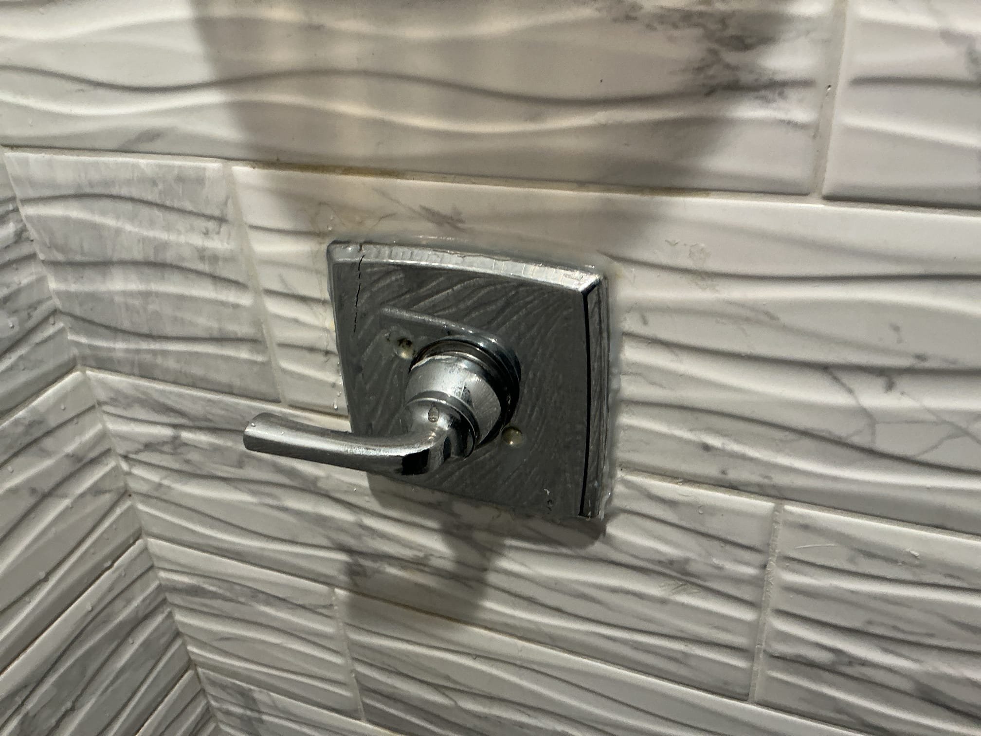 Arrived to the home, client has an existing delta shower valve that the shower head with not stop dripping. At first glance, I can tell that the existing trim is not correct and is missing piece for it. A handyman had used silicone to secure the flange plate to the shower walls. After I extracted the cartridge out, the client approached me and advised me that they would like to go through with the shower valve replacement given the certain circumstances of the existing shower valve. Client has requested to have me come back next Tuesday Morning First Stop to replace the shower valve through tile. I am accepting a deposit to secure client spot on the schedule.