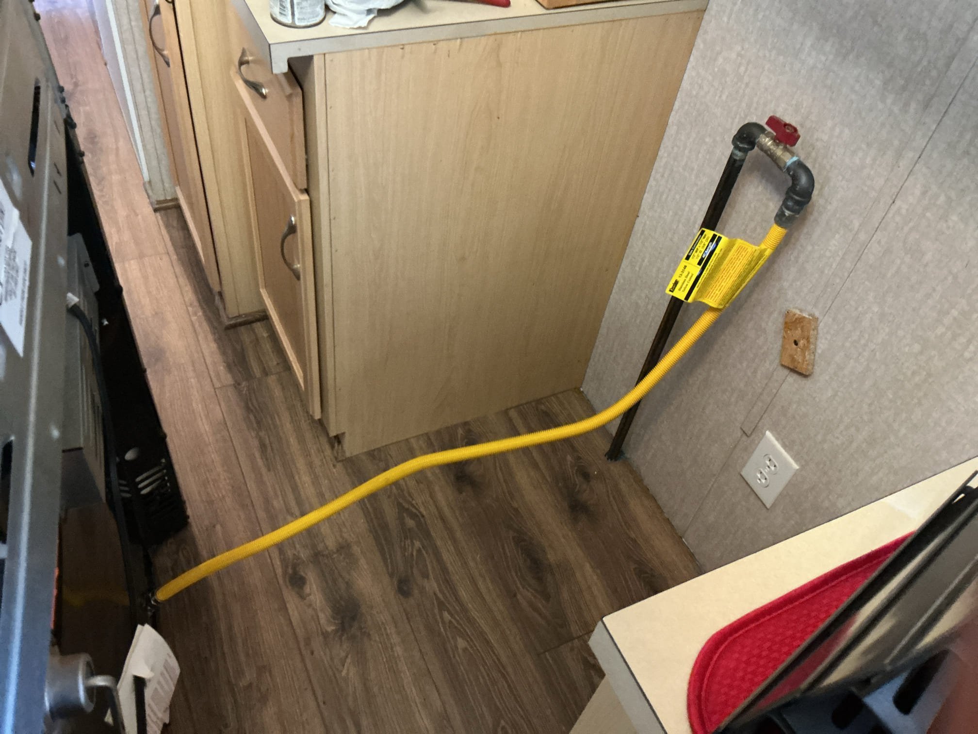 Reinstalled the appliances after the floors are done.
Appliances included washer hoses, dryer vent, stove and fridge.
Supplied and installed new ice maker line for fridge and gas and gas flex for the stove.
Secured all connections and checked for leaks.
There are no leaks at this time.