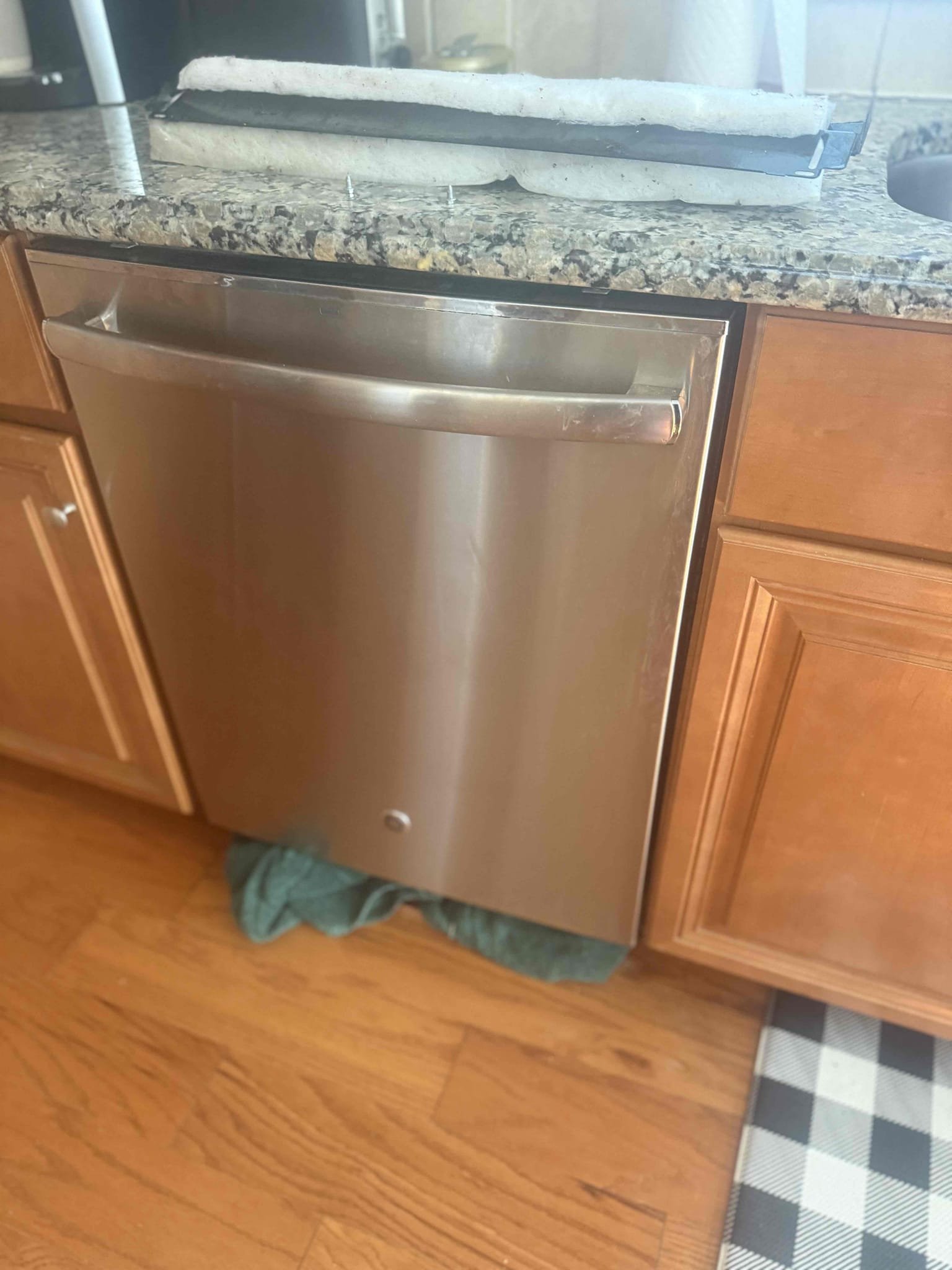 Arrived to home for leaking dishwasher. Upon inspection found dishwasher was full of water and floor was beginning to lift from water damage. Tried to drain it but it would not drain. Pulled out filter for dishwasher and cleaned off and tried again but nothing changed. Gave options to install a new dishwasher once one is bought and on site. Also left options for garbage disposal. Let customer know to call an appliance company if they decided they would rather have it repaired. Will credit 39 towards Any option