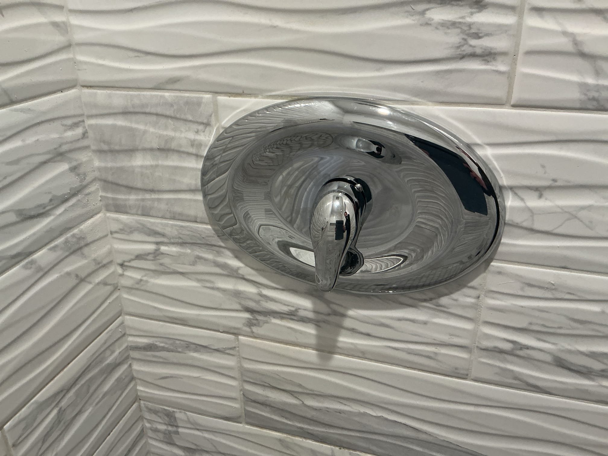 Supplied and installed brand new Moen shower valve with remodel plate.
Turned water off to the home and drained the system.
Cut out and removed existing shower valve from the home.
Prepped copper pipe for new install.
Soldered all my connections.
Reinserted the cartridge and stops.
Turned the water back on to check for leaks.
There are no leaks at this time.
Installed new shower trim.
Caulked shower trim as well.