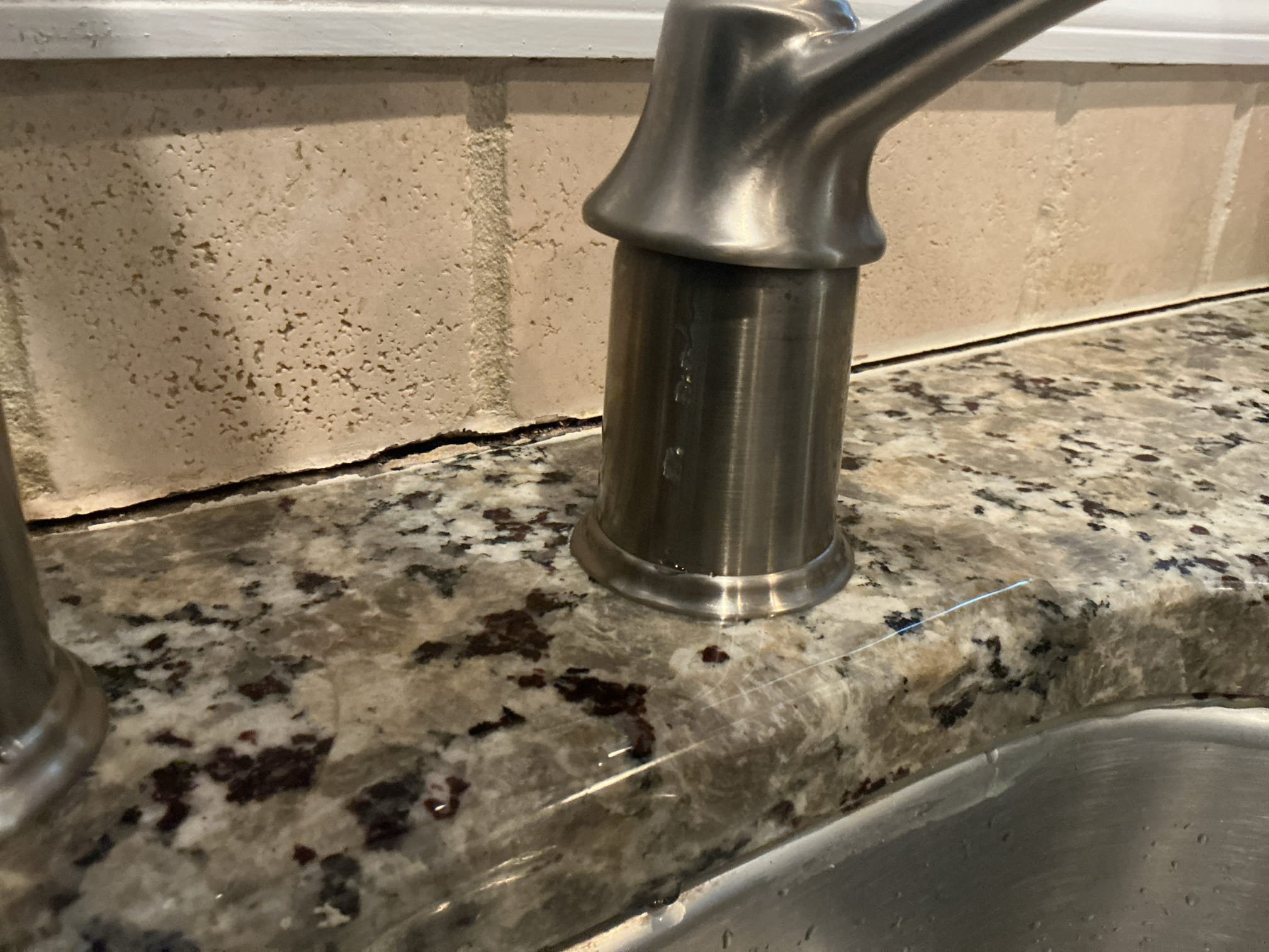 Arrived to the home, client states that their existing kitchen faucet leaks when the valves under the sink are on. It leaks from up top and floods the kitchen countertop with water. I highly recommend replacement of the kitchen faucet. I provided options for replacement and client would like to have MyGuy Plumbing install a brand new Moen Arbor kitchen faucet with a full warranty.

Turned off valves under the kitchen sink.
Disconnected water lines from existing faucet and removed the faucet from the countertop.
Cleaned surface of counter top.
Supplied and installed a brand new Moen Arbor kitchen faucet.
Secured new faucet to the countertop.
Made up water connections.
Turned valves on and ran water to check for leaks.
There are no leaks at this time.
Plugged off other hole using a sink hole cover for the client.
