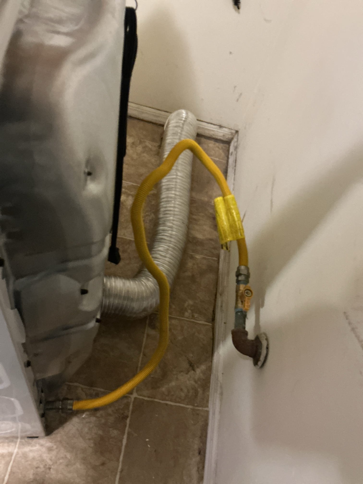 Removed existing dryer vent flex pipe in crawlspace.
Supplied and installed new hard pipe dryer vent pipe in crawlspace to the existing termination. 
Attached piping using foil tape
Strapped piping using drive.
Secured all connections.
Supplied and installed new gas cock and gas flex.
Turned valves on and ran the dryer to check for leaks.
Dryer is exhausting properly and there are no leaks at this time.

*Hooked up washing machine as a one time curtesy.
*Customer is now a member.