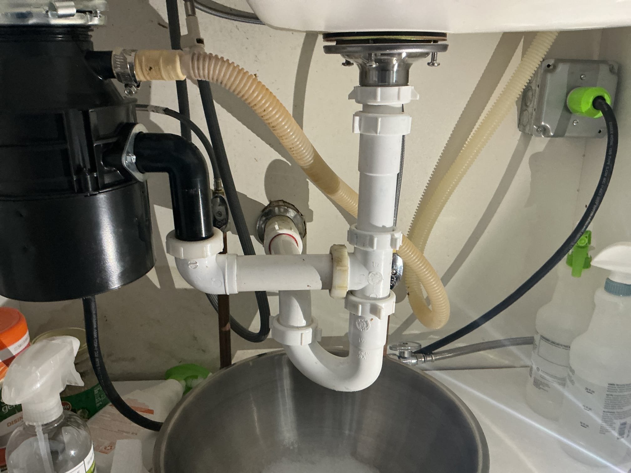 We had recently did a complete rebuild under the kitchen sink, we arrived today due to a leak from the drainage underneath. I discovered that the tubular drainage had slipped apart causing the leak, also the basket strainer was loose. I tightened down the strainer and installed a new tubular extension. I secured lil my connections and pressure tested the sink to check for leaks. There are no leaks at this time.