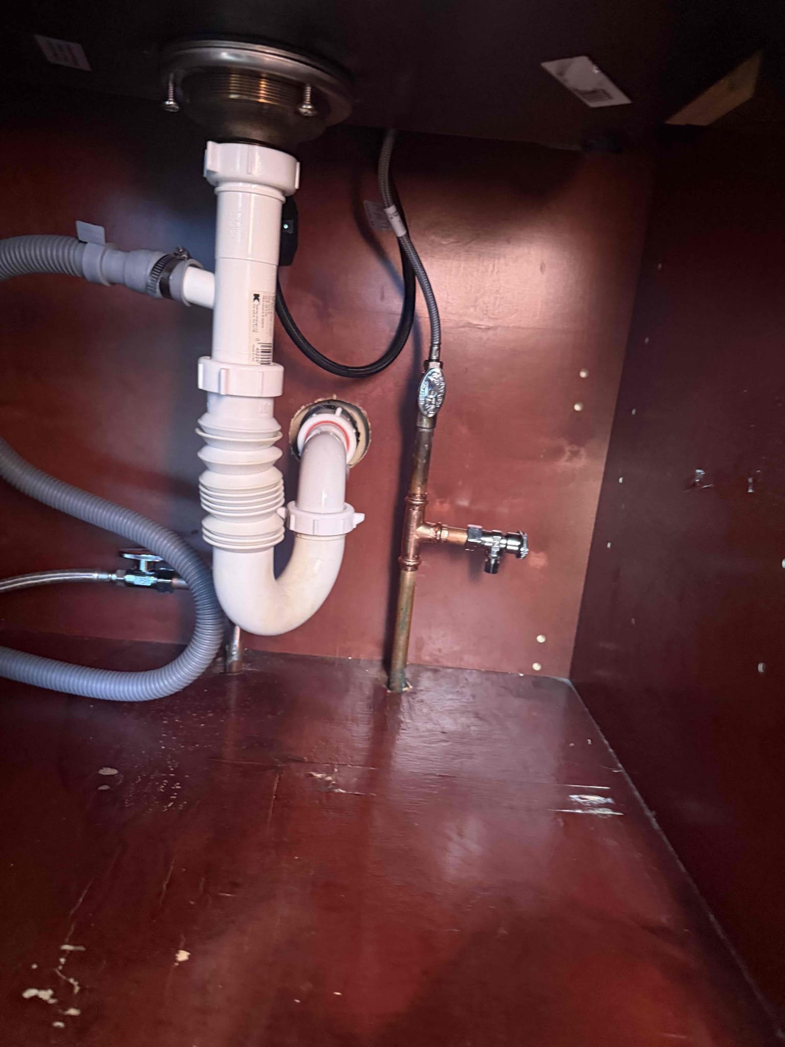 Arrived on site customer stated that they had a leak. After inspecting we noticed that the T for the hot side shutoff valves is leaking, we also noticed that the accordion trap is leaking from the nut. MyGuy plumbing gave customer options to rectify all issues. For today customer would just like to move forward with rectifying leak and adding a new shutoff valve for ice maker line if customer decides to get a fridge with an ice maker line. After all work was completed MyGuy plumbing turned the water back on to the home and tested for leaks. At this time there are no leaks found everything is working. As should.