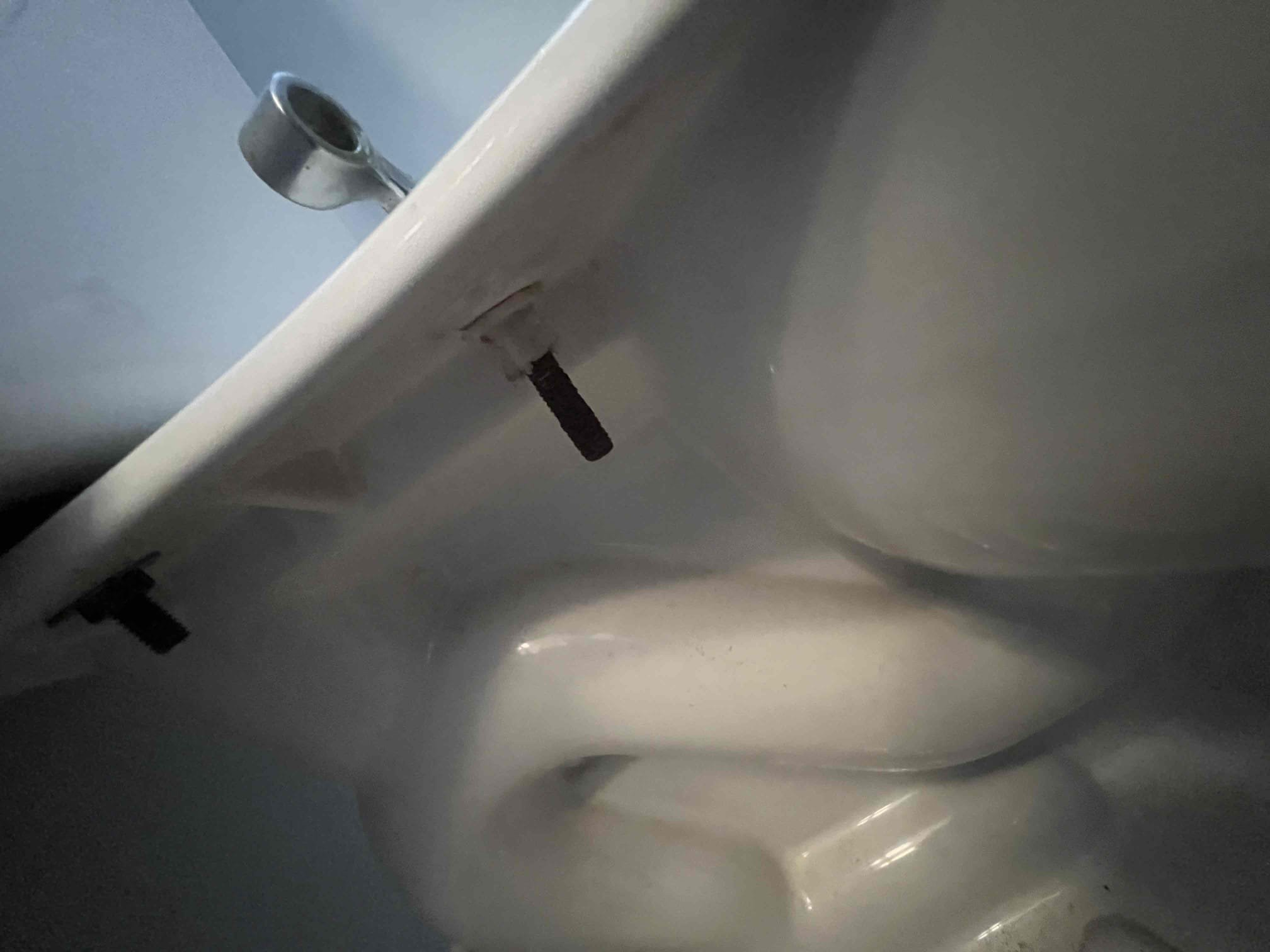 Arrived on site and client stated she would like for us to remove the old nuts that are stuck on the toilet from the previous toilet seat that was there and they have a dripping kitchen faucet that does not turn off properly. Upon inspection underneath the kitchen sink both shutoff valves cannot be turned by hand. Client also has a gate valve for the main that I recommend get replaced. Client would just like for us to remove old nuts from toilet and install new toilet seat for today. 