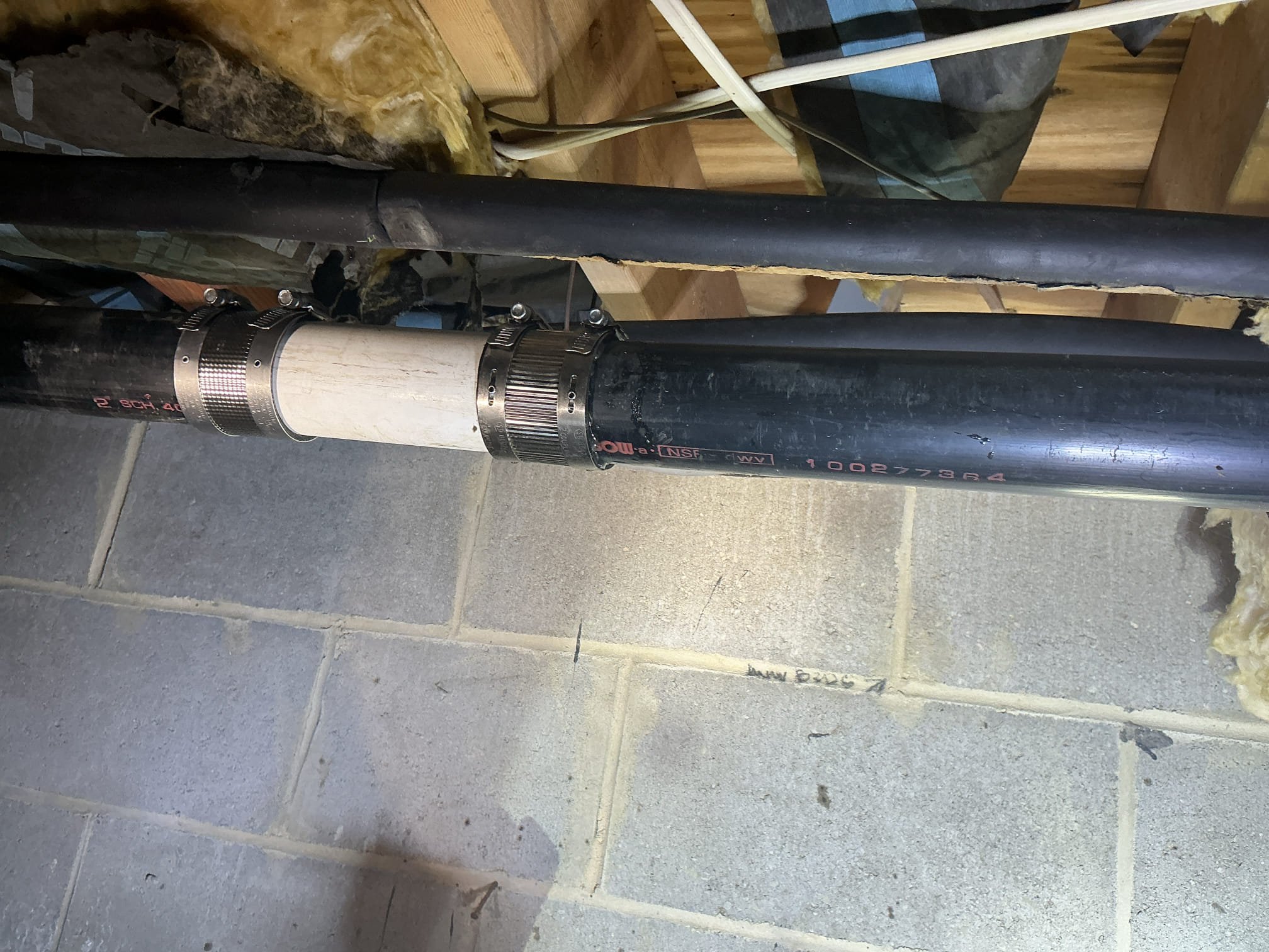 Arrived to the home, client is selling the home to their son and they are moving out of state. The had a home inspection done and there were a few issues that the inspector flagged them on. Main issue was a broken sewer line in the crawlspace and copper piping no being strapped and is laying on the ground. Also the inspector stated that the gas line that penetrates the block in the crawlspace is not sleeved. The hole that the original installer drilled for the gas line is very large for the half inch pipe so they used spray foam to make up the difference. The gas line is not touching any concrete and does pose any real issues at this time. I provided options to repair the broken drain and strapped up the copper piping for the client.

Cut out and removed broken drain line in crawlspace.
Adapted to existing drain line using no hub couplings.
Supplied and installed new drain pipe and fittings.
Secured my connections and checked for leaks.
There are no leaks at this time.

*Strapped up co